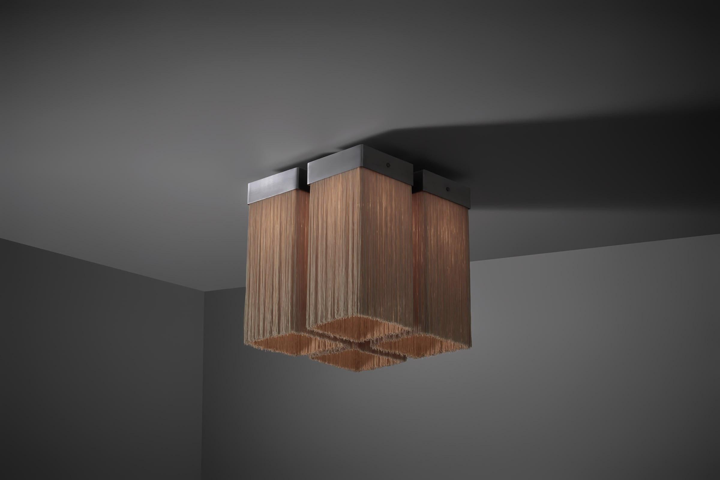 Rare Massimo Vignelli Pendant mod. '2094/4' for Arteluce, Italy 1964. Intriguing pendant composed of brushed aluminium cubing rings, a black lacquered frame, and pearl-colored silk-cotton fringes. The combination of the elegant and classic-looking