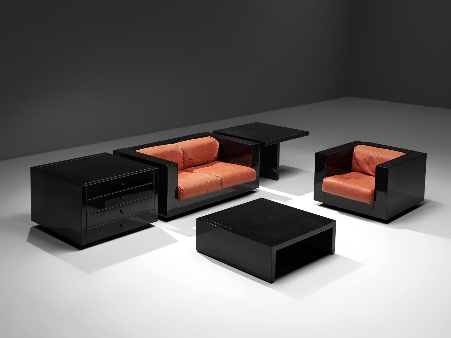 Massimo and Lella Vignelli for Poltronova, Saratoga living room set, black lacquered wood and red leather, Italy, 1964. 

This living room set named 'Sartoga' is designed by Italian designer couple Lella & Massimo Vignelli. The Vignelli's were