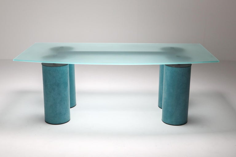 Acerbis, turquoise desk or table manufactured by designed by David Law, Lella and Massimo Vignelli.
An opalescent crystal top on a turquoise cylindrical base.
Measures: H 72 cm x D 100 cm x W 200 cm.


