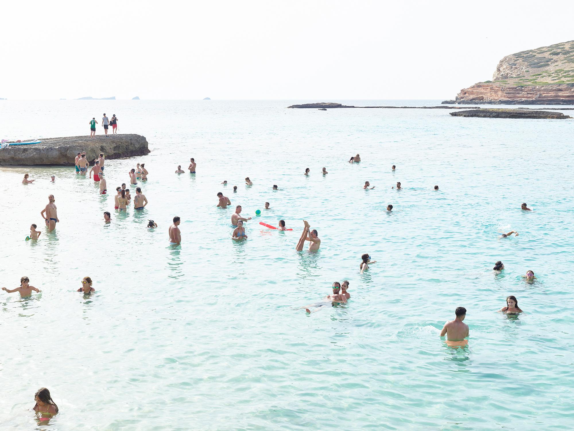 Cala Conta Point - large scale Mediterranean beach scene (artist framed) - Photograph by Massimo Vitali