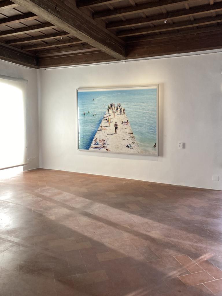 Carcavelos Pier Paddle (framed) - large scale photograph of summer beach scene - Print by Massimo Vitali