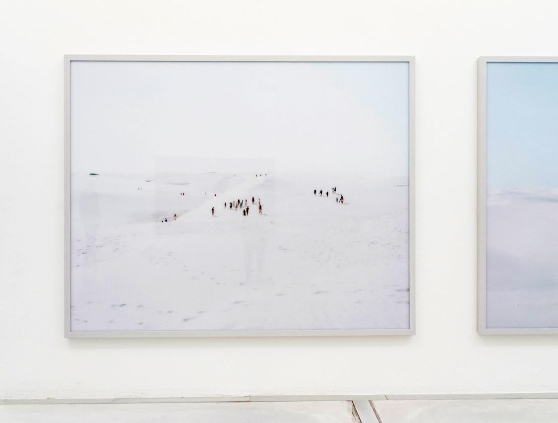 large format photograph of Gulpiyuri, a flooded sinkhole with inland beach in Northern Spain, by iconic Italian photographer Massimo Vitali, renowned for his grand scale topographical observations of the rites and rituals of modern