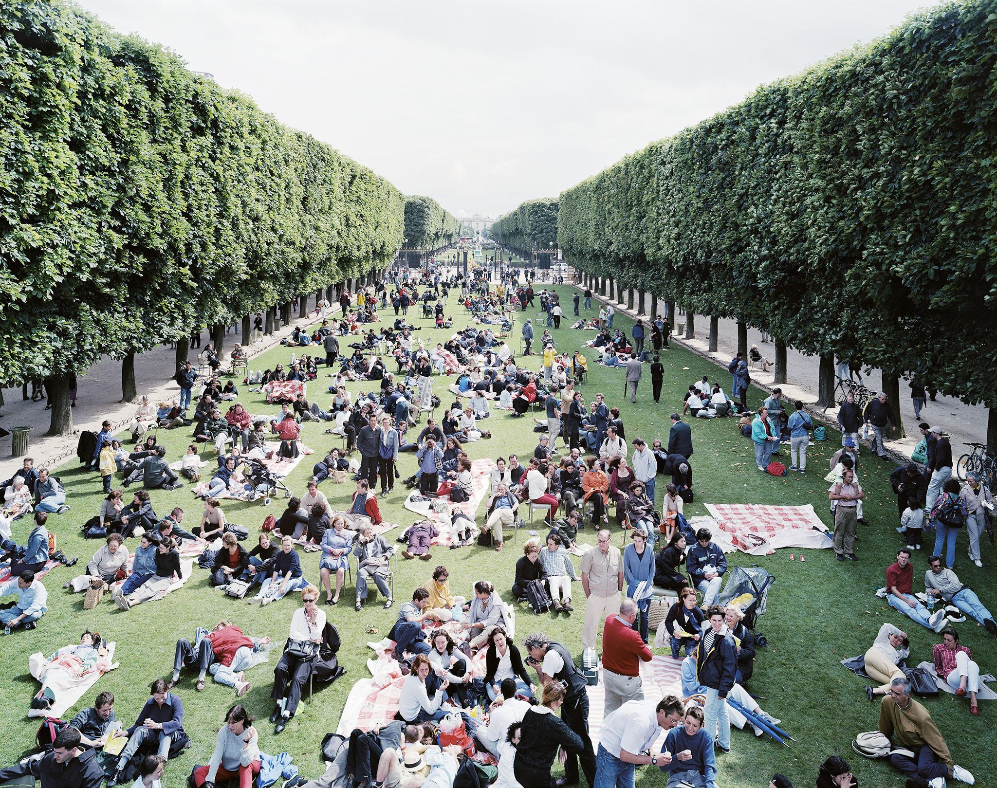 Massimo Vitali - Pic Nic Allée, 2000 by Massimo Vitali a large-format photograph. 
One of the most iconic Vitali's photograph. This art-work was presented at The Venice Biennale in 2011 curated by Harald Szeeman. It is present in some of the most