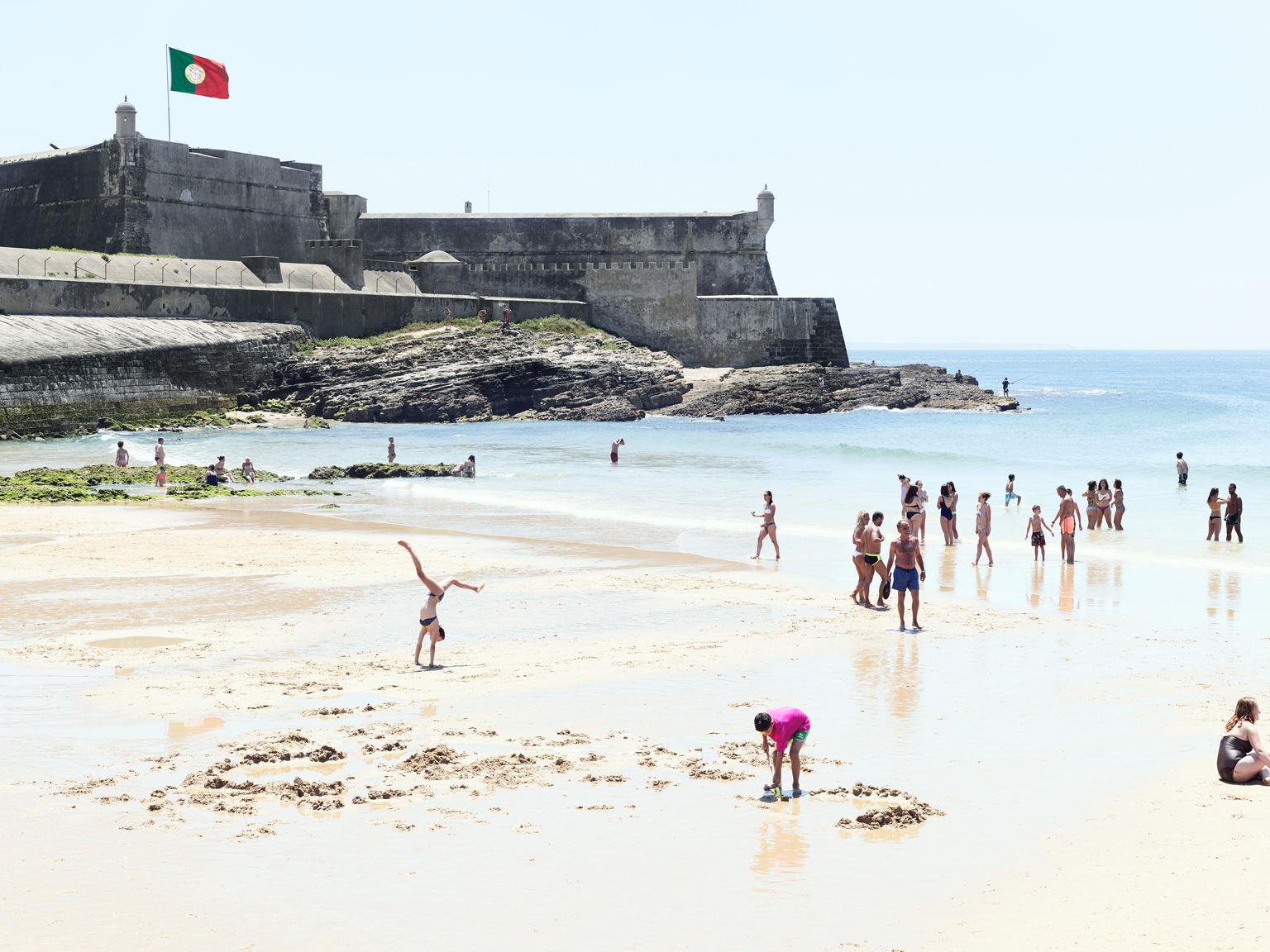 Praia do Moinho Handstand - large scale Massimo Vitali beach scene (framed)