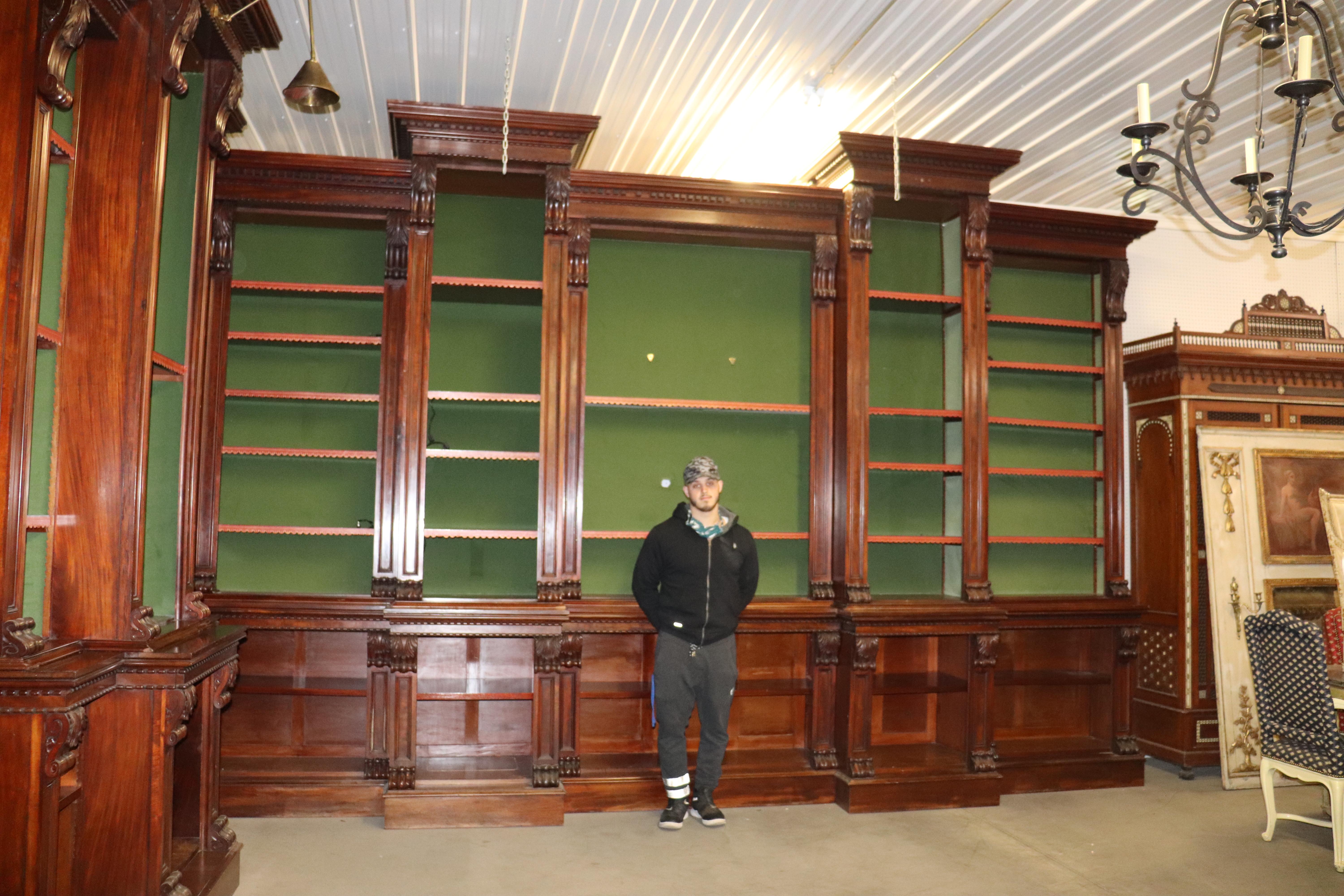 This is part of a 3-piece set and can be purchased as a set or separately. The bookcases were custom made for a bank owned by the Dupont family. They are made up of many pieces and do come completely apart. They have all been wired for electricity.