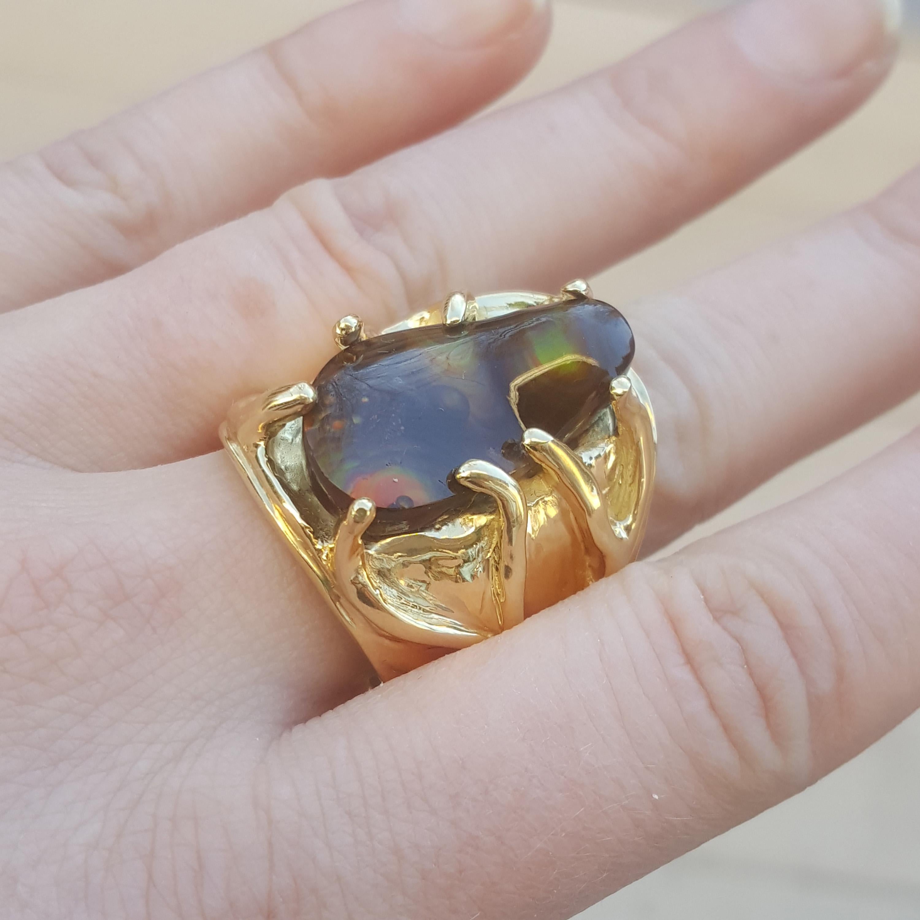 Fire agate is one of my favorite materials for men’s rings; the subtle elegance is great for making a statement without too much noise. This particular ring is massive, weighing in at over 56g of solid 18kt gold. The bold, statement making piece is