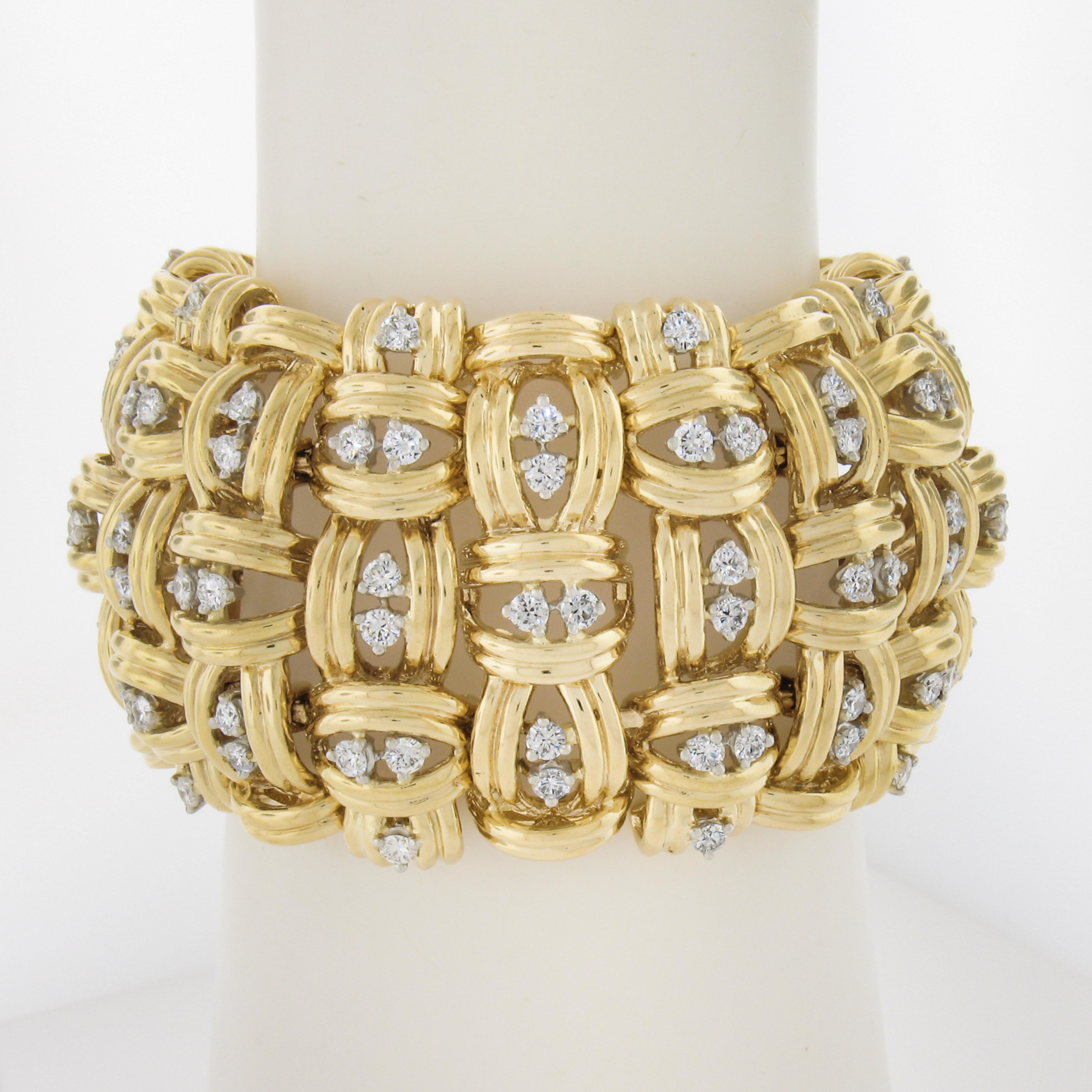At just under 2in. wide and just under 200 grams of gold - you are looking at a super substantial bracelet! This amazing bracelet is covered in approx. 11ctw of round diamonds and is absolutely NOT for the faint of heart! Enjoy!

--Stones:--
126