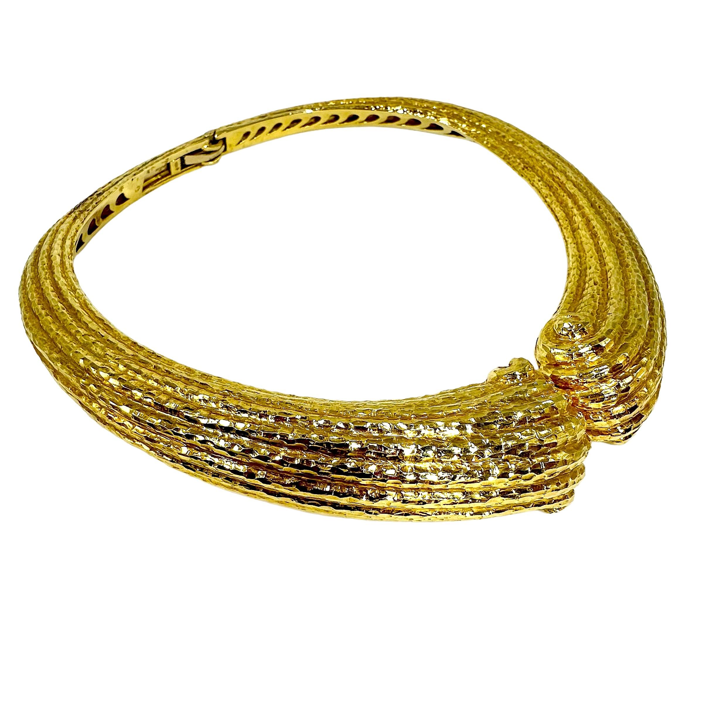 This massive and striking 18K yellow gold Italian choker necklace was manufactured during the Mid-20th Century, to the very highest standards of the gold crafting art. It is finished on all of it's frontal surfaces with a deeply chiseled, hammered