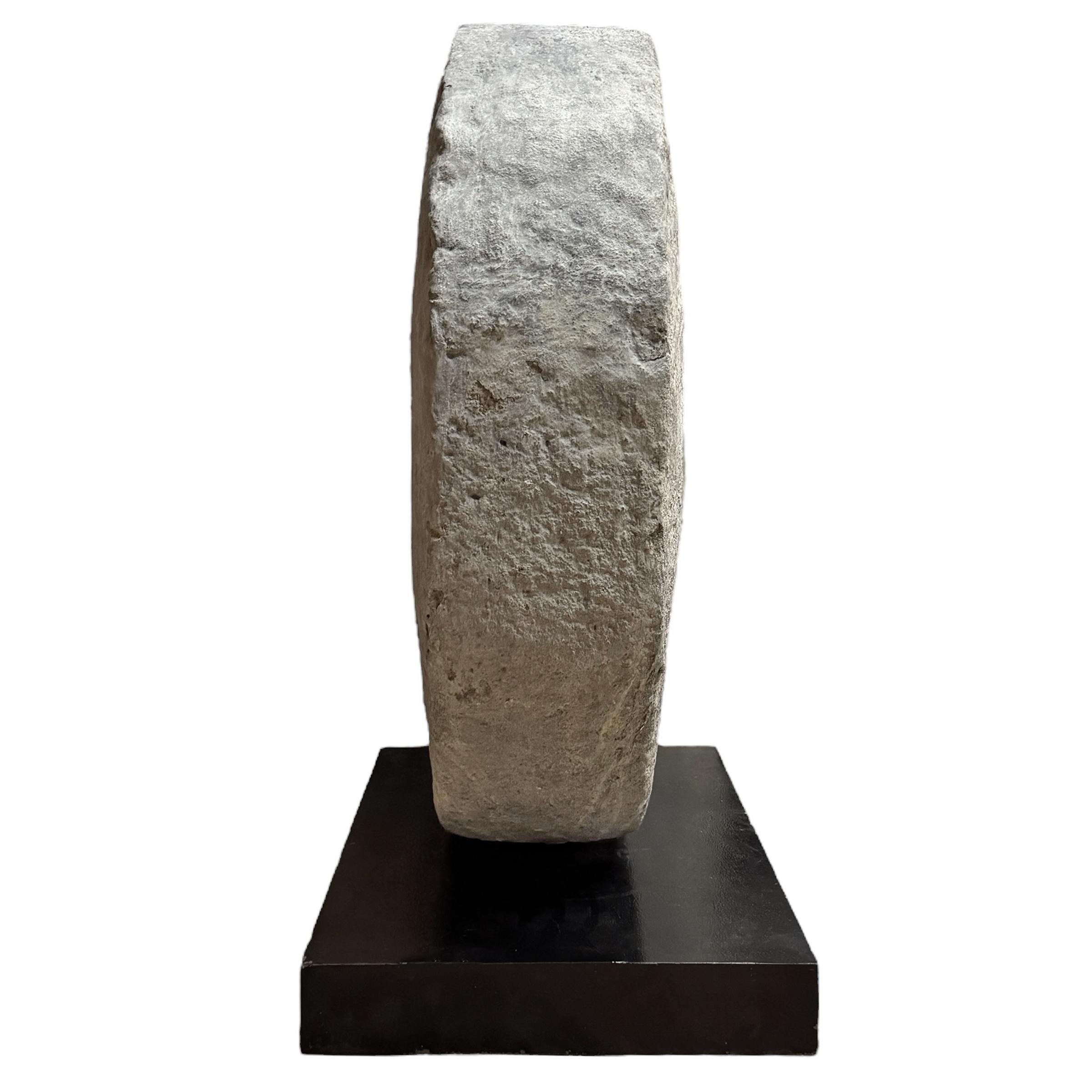 Hand-Carved Massive 18th Century Limestone Grinding Stone on Custom Steel Mount For Sale