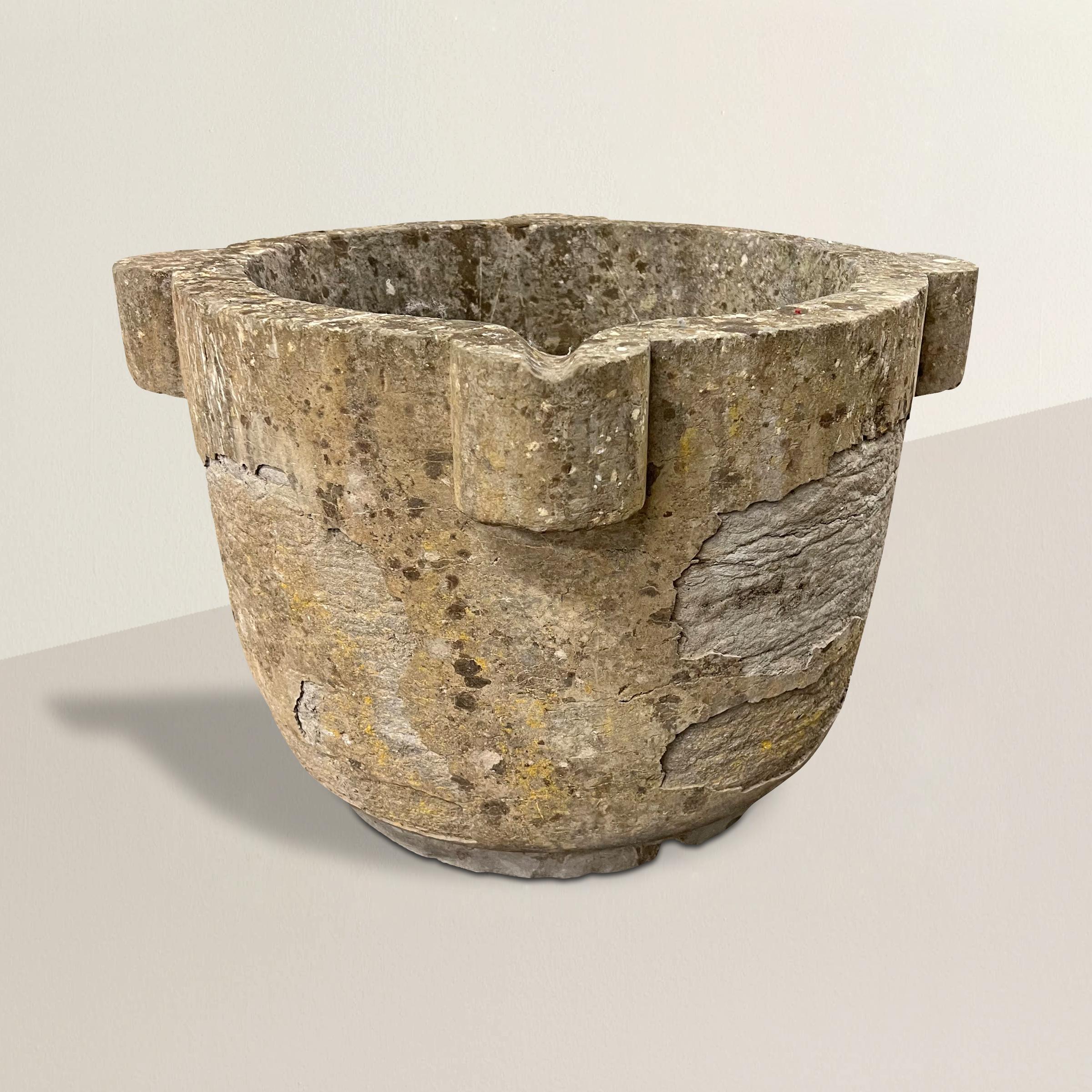 A remarkable massive 18th century French limestone mortar with an incredible weathered surface with lichens. An incredible scale, perfect for planting an ornamental bush, bulbs in the spring, or leave empty and enjoy the beauty of this monumental