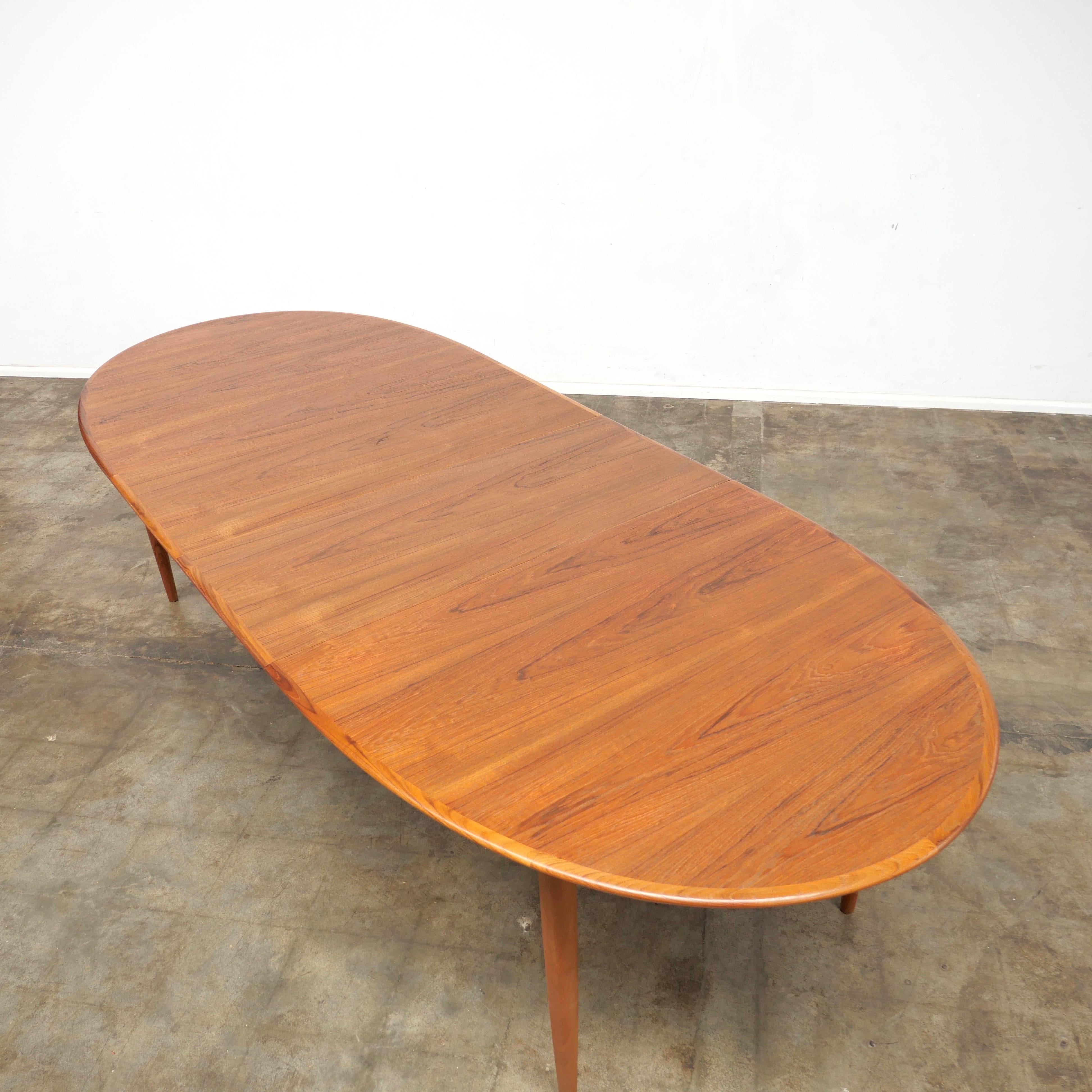 Invite your husband’s distant relatives around for Christmas with this massive Australian 10-12 seater 60’s Parker Nordic dining table. Sits six contracted then add the two extension pieces for optimum hospitality. Freshly restored and finished with