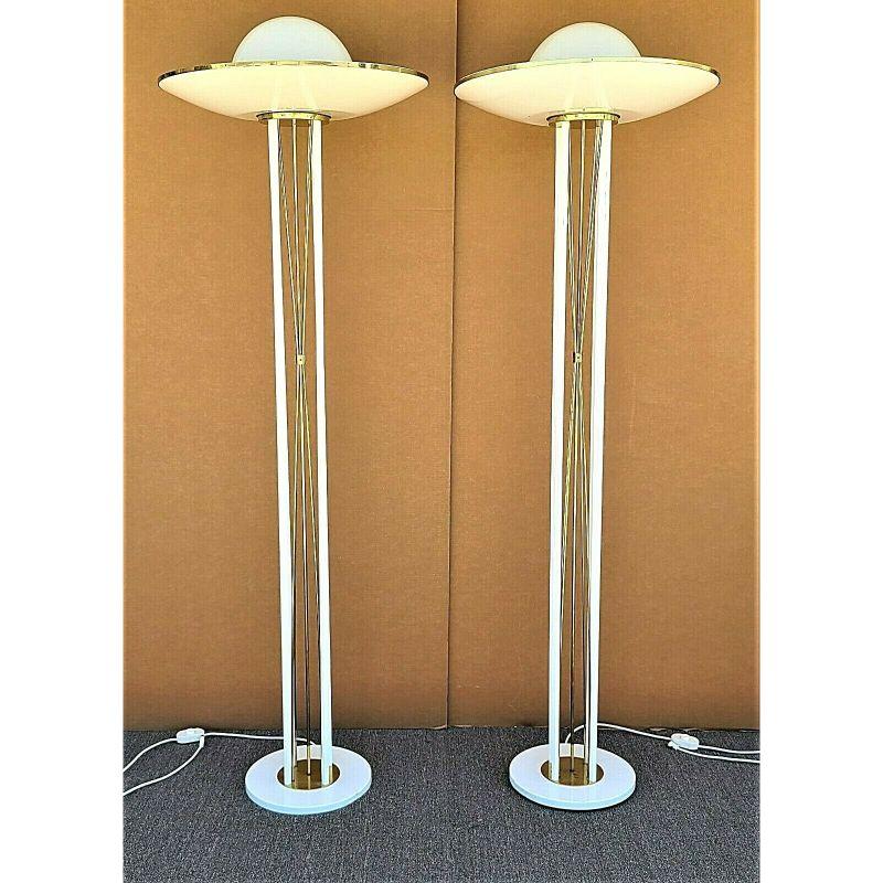 Offering One Of Our Recent Palm Beach Estate Fine Lighting Acquisitions Of A
Pair of Massive 1970's Art Deco Reggiani Italian Style Torchiere Floor Lamps 

Featuring enameled steel bases, supports, and torchier shades, brass internal support