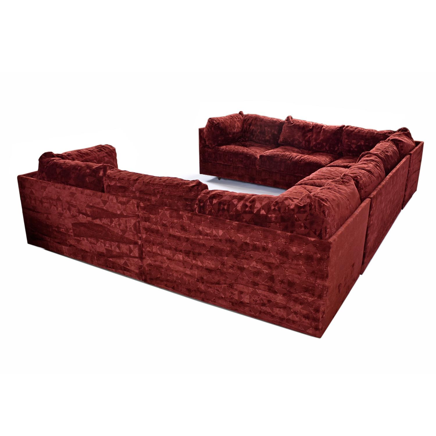 Giant sectional sofa with striking Jack Lenor Larsen Style fabric.  The diamondesque parquet assemblage of textile is uniquely iridescent and textured, adding another layer of sexy 1970’s authenticity.  Seat cushions are both channel stitched and