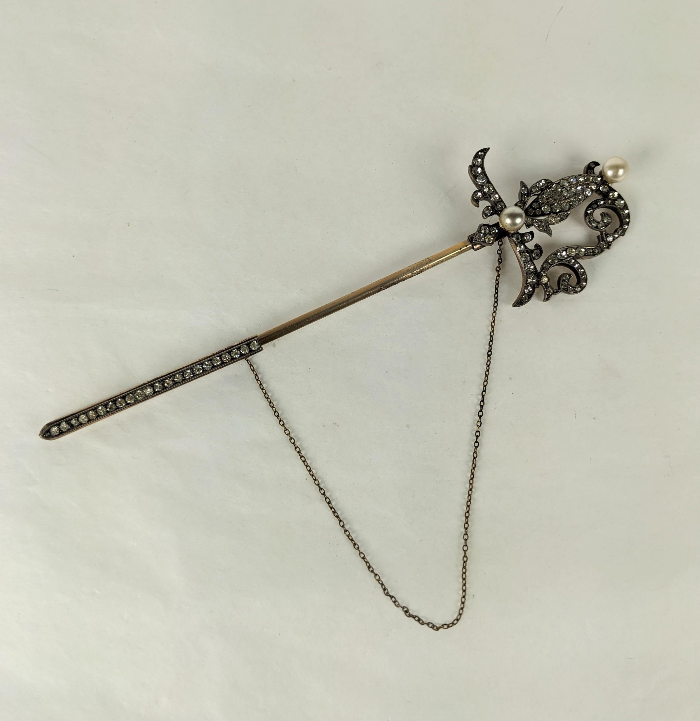 Massive and exceptional 19th Century Paste Sword Jabot Brooch from the l9th Century. Designed likely for a heavy cloak or cape set in sterling with pastes and faux pearls. 
Gold Vermeil backing with safety chain attached. 6.5
