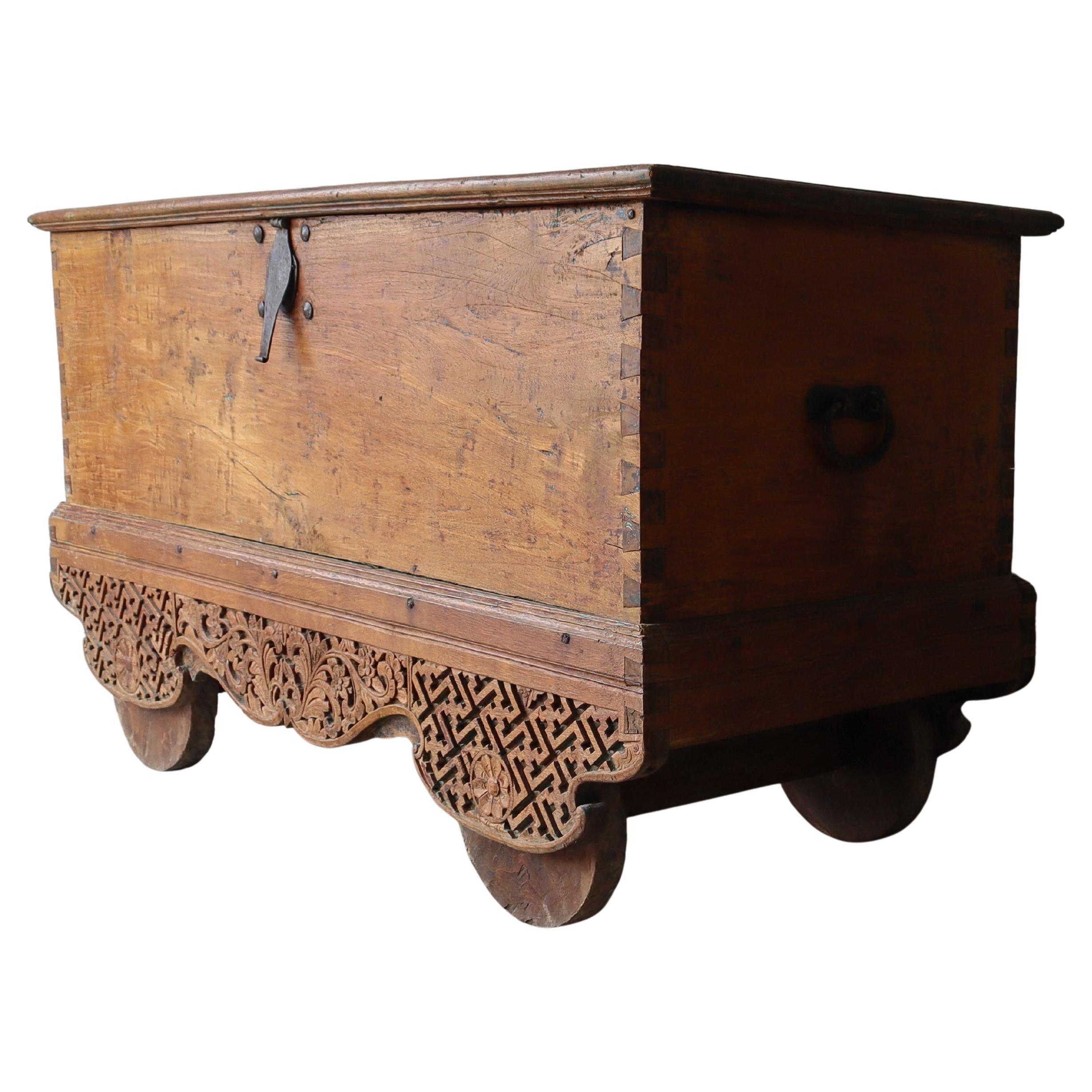 Massive 5ft Antique Carved Teak Wheeled Dowry Chest en vente