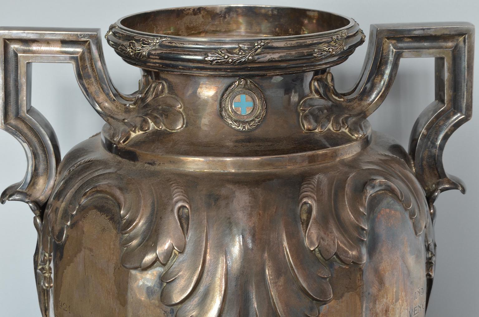 Massive silver vase trophy/cup “Tiro Federal Argentino“, 1916-1939.
With a Frensh Hallmark at the edge of the top for Silver Fineness .950. 
(Mercury Head and number 1 for Silver Fineness .950 - Frensh Export Silver Hall Mark for big articles