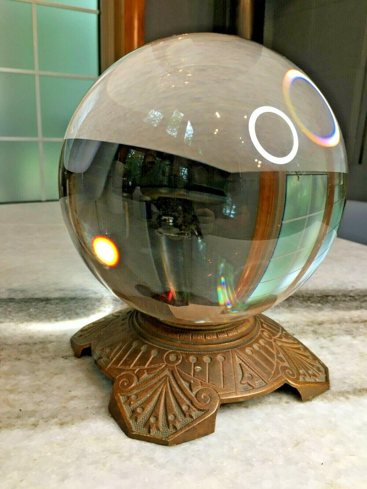Stunning!
Crystal ball is massive at 8 inches in diameter!
Metal stand is sturdy and well made with ornate, fine, Art Nouveau/Victorian details.
See sizing relative to a standard us soda can.
Ball on stand measures approximately 9.5