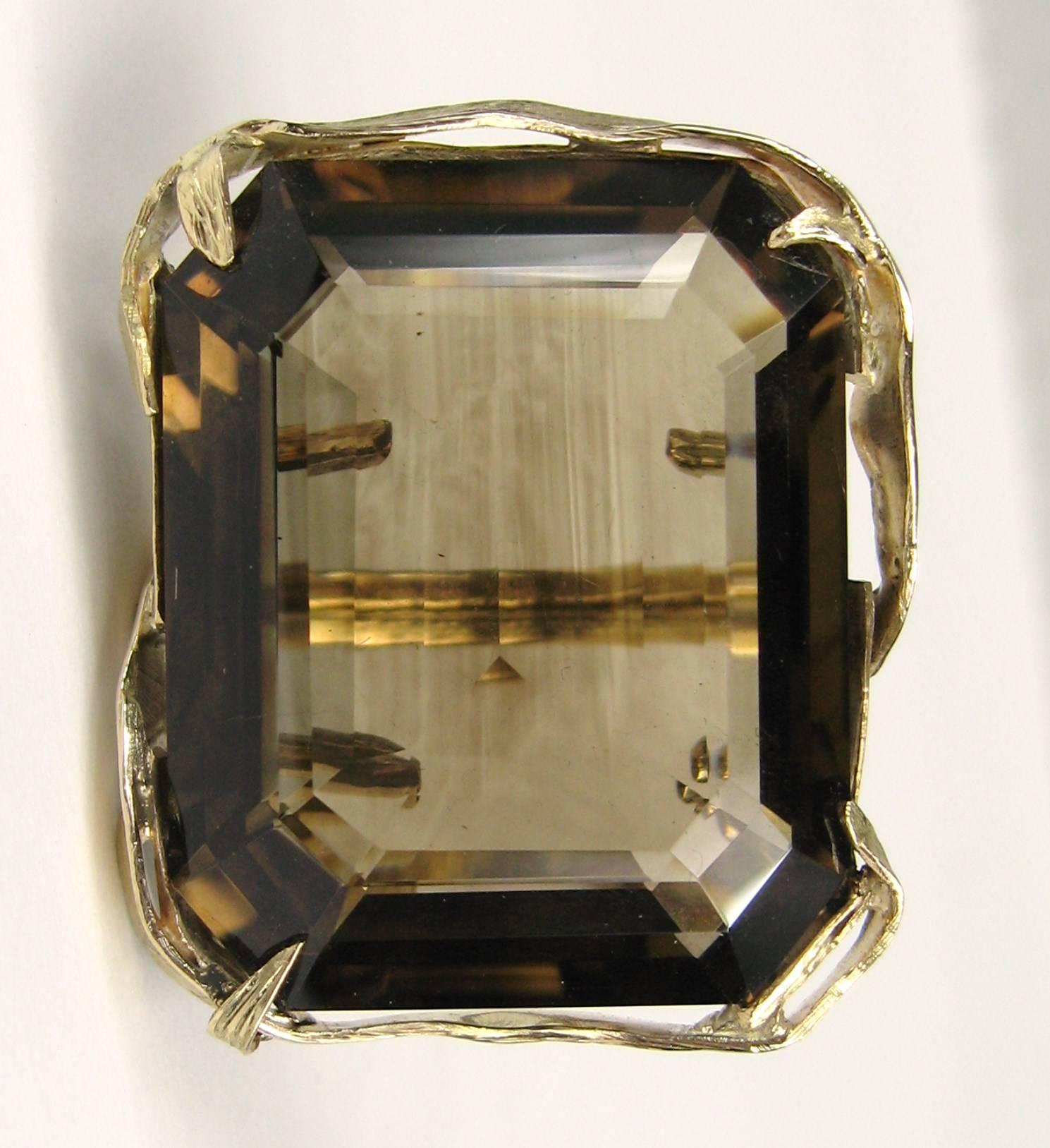 This is a one of kind Custom Made 95 Carat Smokey Topaz 14K Gold Cocktail Ring. Measuring 1.53 inches x 1.30 inches wide on the stone set in a 14K. The stone is approximately 95.25 carats.  The ring is a size 6.5 and can be sized by us or your
