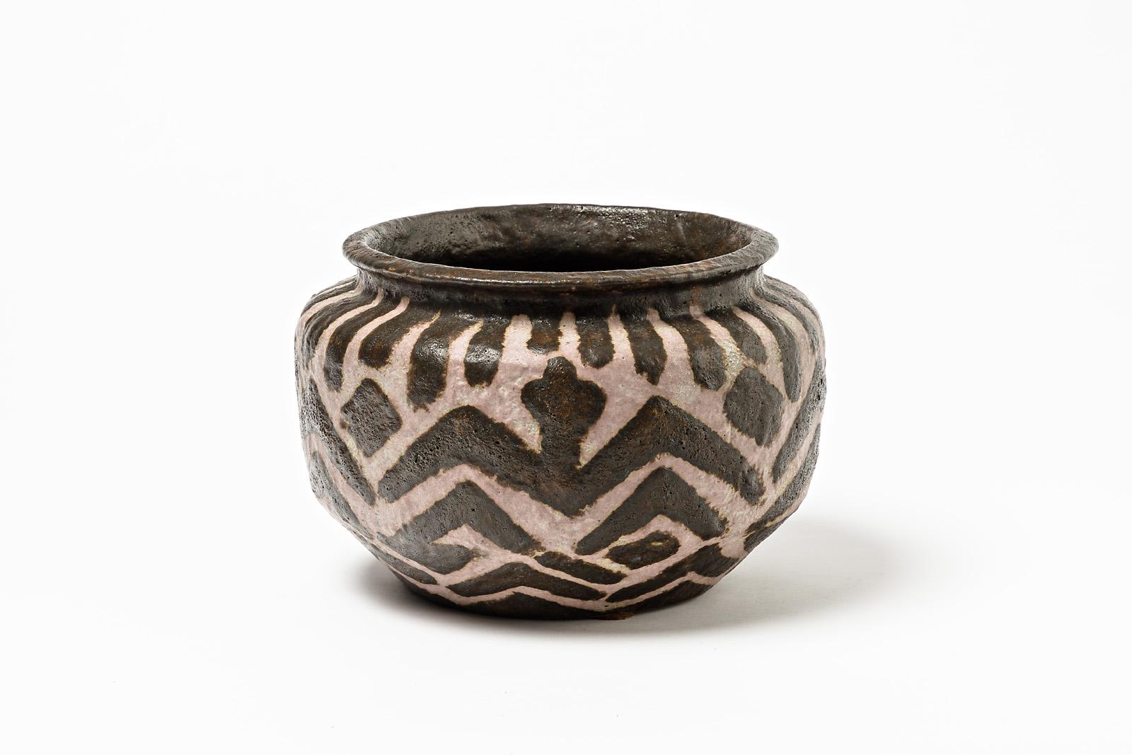 Joseph Massé 1878-1946 (in relation with Jean Carriès)

circa 1930, signed under the base.

Massive Africanist ceramic vase by the French artist. Rare and important vase with rich decorations.

Elegant black and pink colors.

In the style of