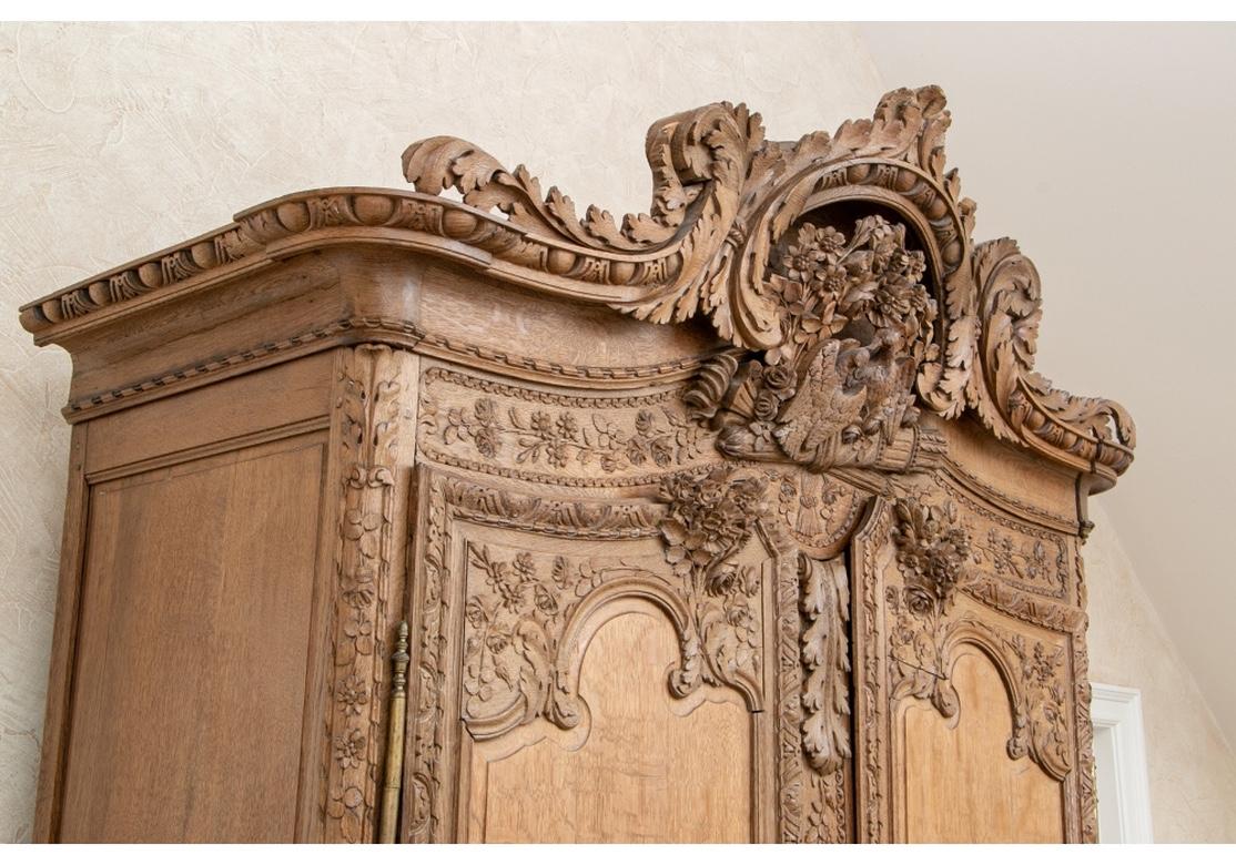 20th Century Massive and Elaborately Carved French Country Armoire