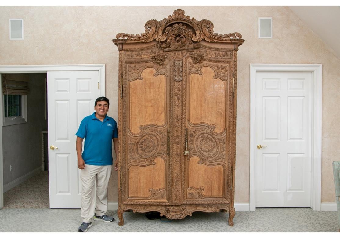 Wood Massive and Elaborately Carved French Country Armoire
