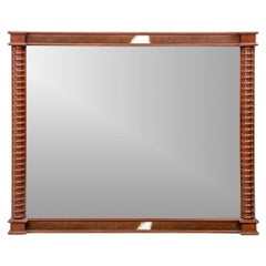 Miroir massif et bien fait en cerisier et en cuir de vache