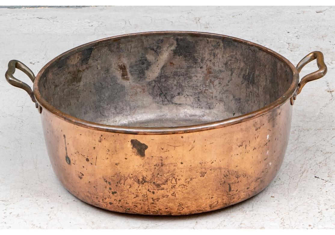 An antique tin lined copper cauldron with great size and good weight in all original condition. Fine age patina and the cauldron presents very well.
Measures: Diameter 27 1/2