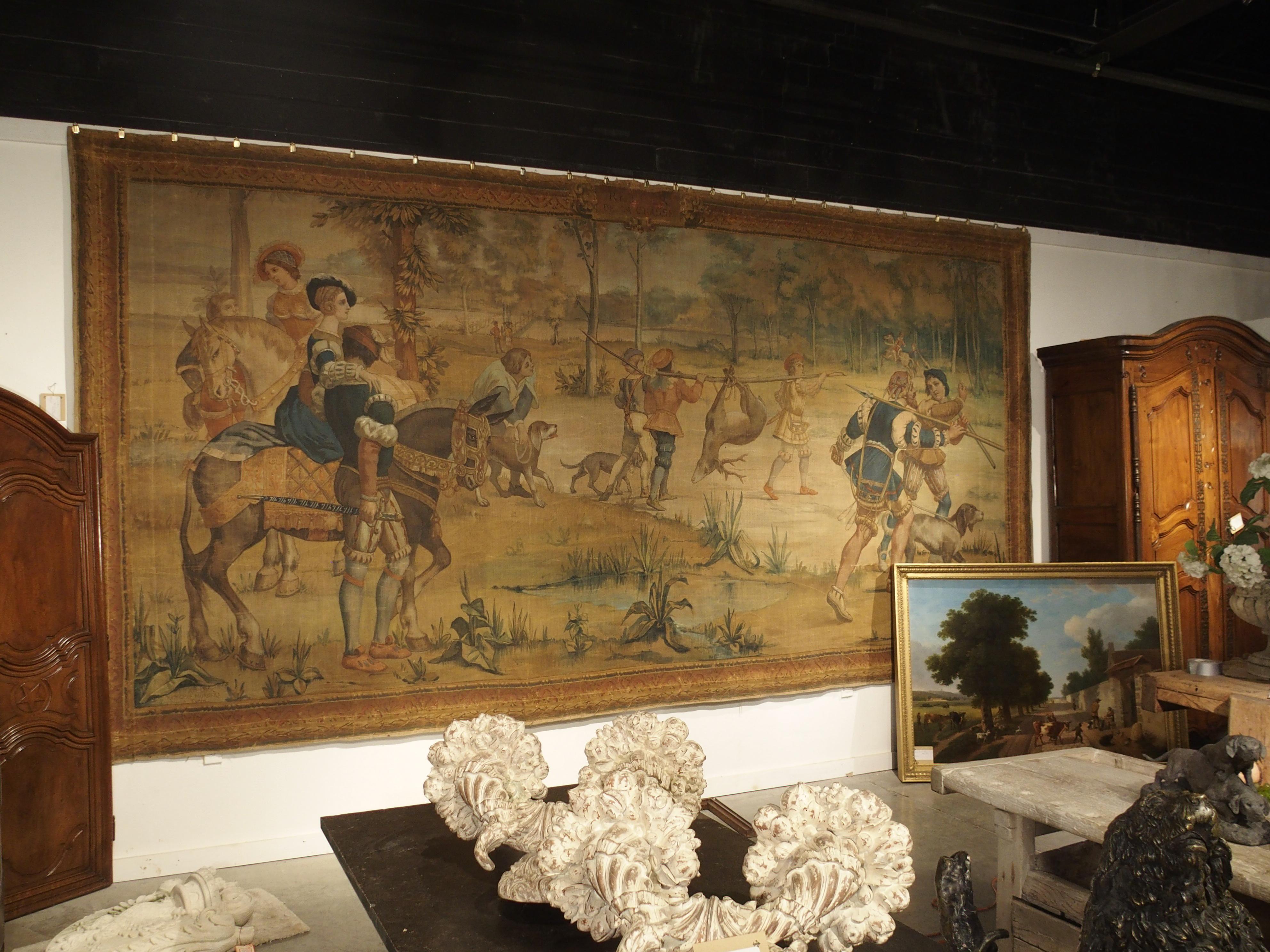 This massive hand painted 19th century canvas is more than 8 feet tall and 16 feet wide. The vibrant colors (brown, green, blue, cream, red, yellow and gray) are fantastic for a canvas of this age. The canvas has a 8 ½ inch stylish border all the