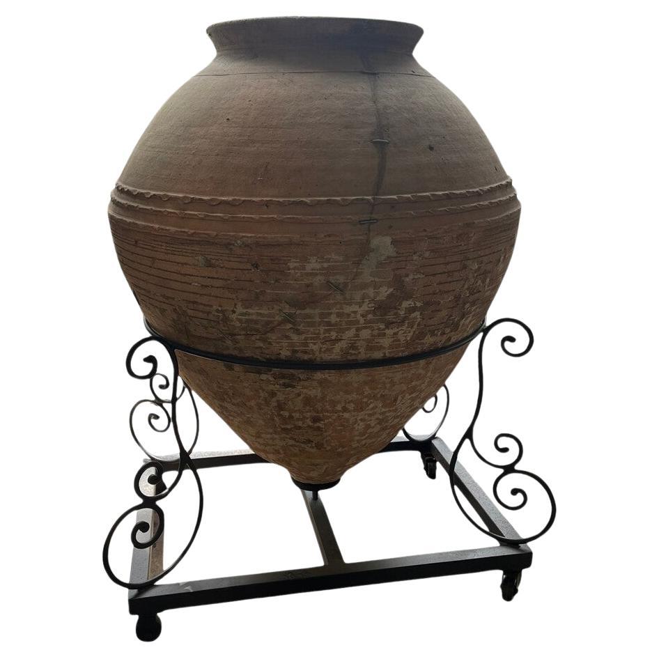 Massive Antique Mediterranean Terracotta Wine Amphora Vase on Metal Rolling Base For Sale
