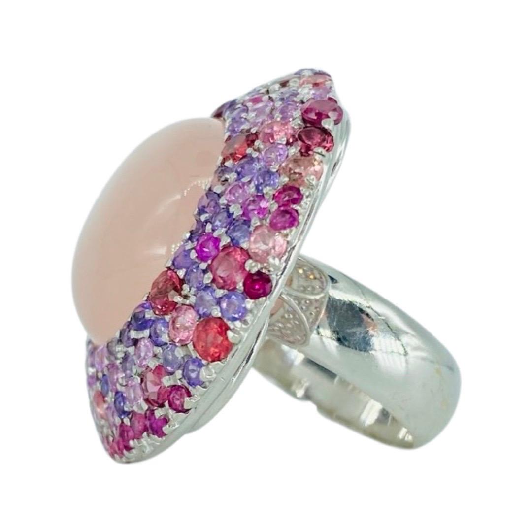 Massive Native Brazilian Gemstones Baobab Tree 18K White Gold Cocktail Ring. The ring features a rose quartz gemstone in the center weighting approx 33 carat and surrounded by approx 59 carats of tourmalines, topaz and sapphires. All gemstones are