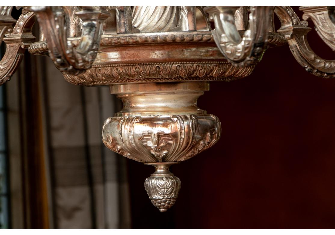 Patinated Massive Baroque Style Silvertone Ten Light Chandelier