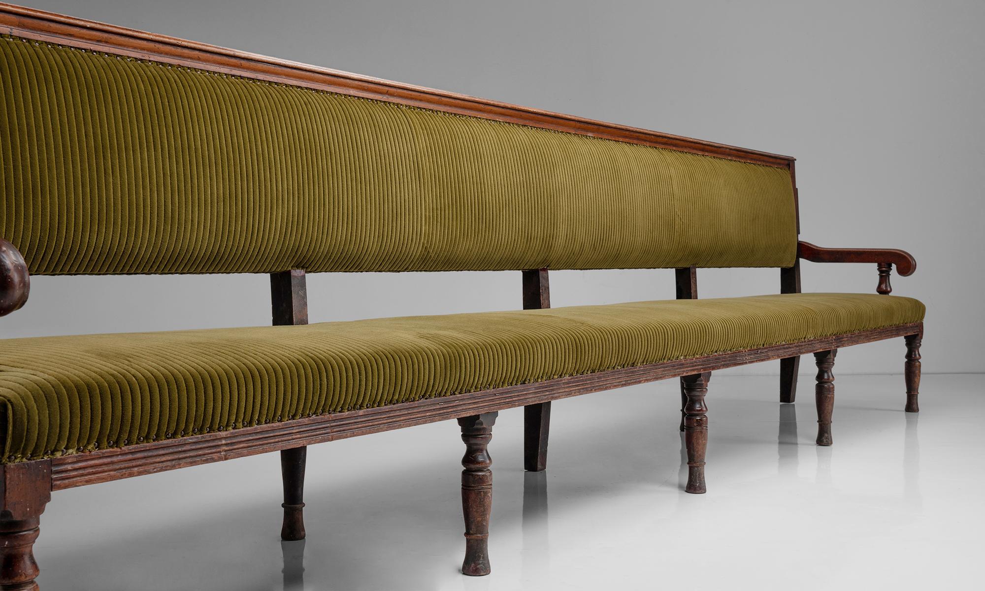Massive Billiard room bench in wide wale velvet Corduroy

England Circa 1880

Mahogany frame in original condition with turned legs. Newly upholstered in wide Corduroy by Maharam.

Measures: 162