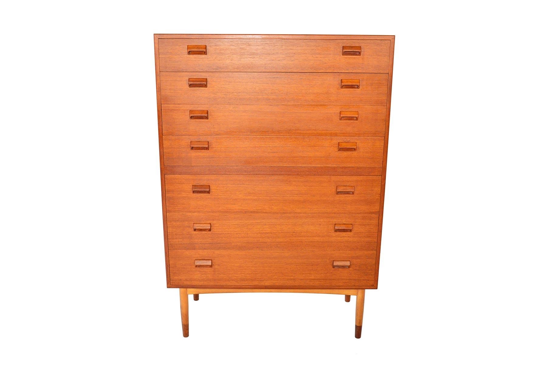 One of the largest highboy dressers ever produced in Denmark, this massive piece designed by Børge Mogensen for Søborg Møbelfabrik in 1951. The case is crafted in teak and stands on an oak base. Each drawer is adorned with the designer’s signature