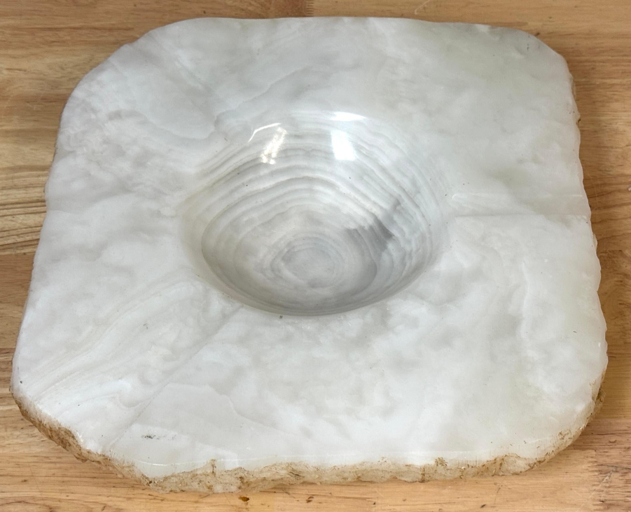 Monumental Carved and Polished Rock Crystal Quartz Ashtray with Live Edge, circa 1960s

Dimensions: 14