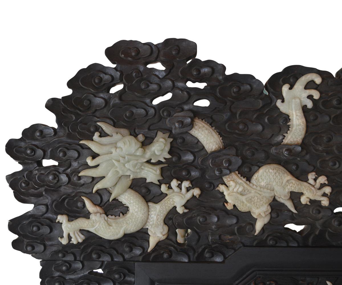 20th Century Massive Chinese Jade Screen with Jade Dragons Among Intricately Carved Clouds For Sale