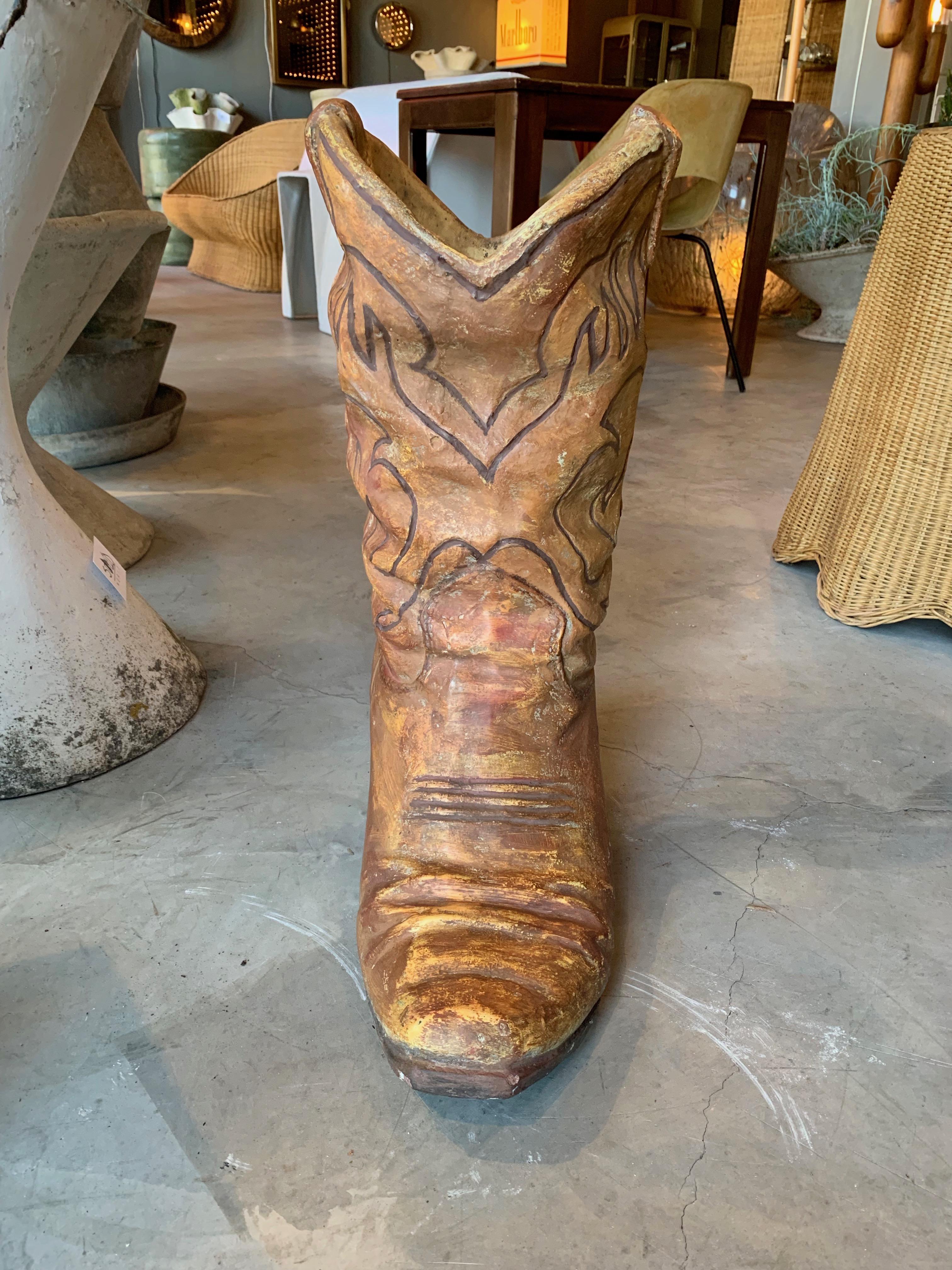 large concrete cowboy boot planter