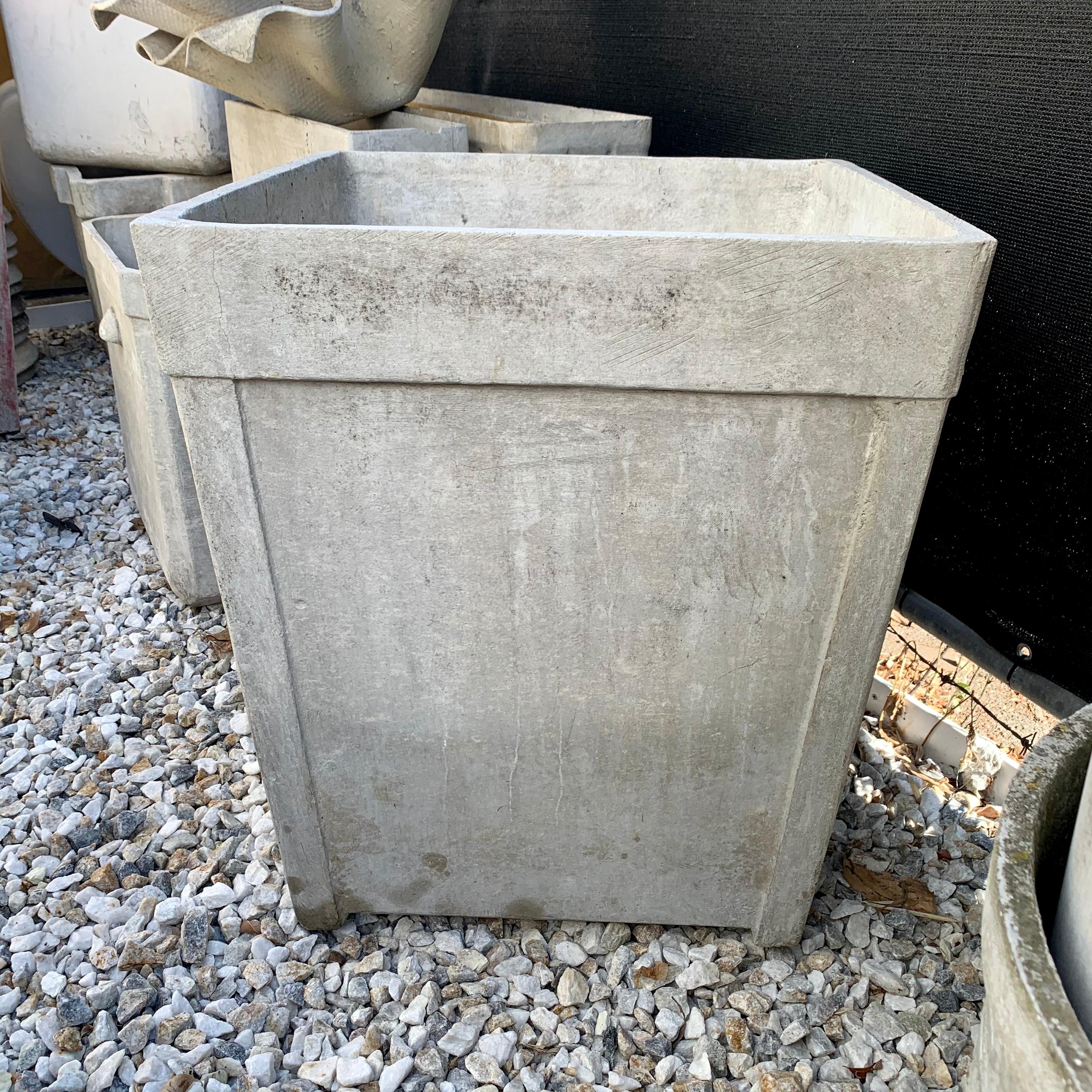 Massive concrete tree planter by Willy Guhl. Tall planter with 4 post feet raising the planter slightly off the ground. Very good condition. Perfect for a large plant or tree, indoors or out.



 