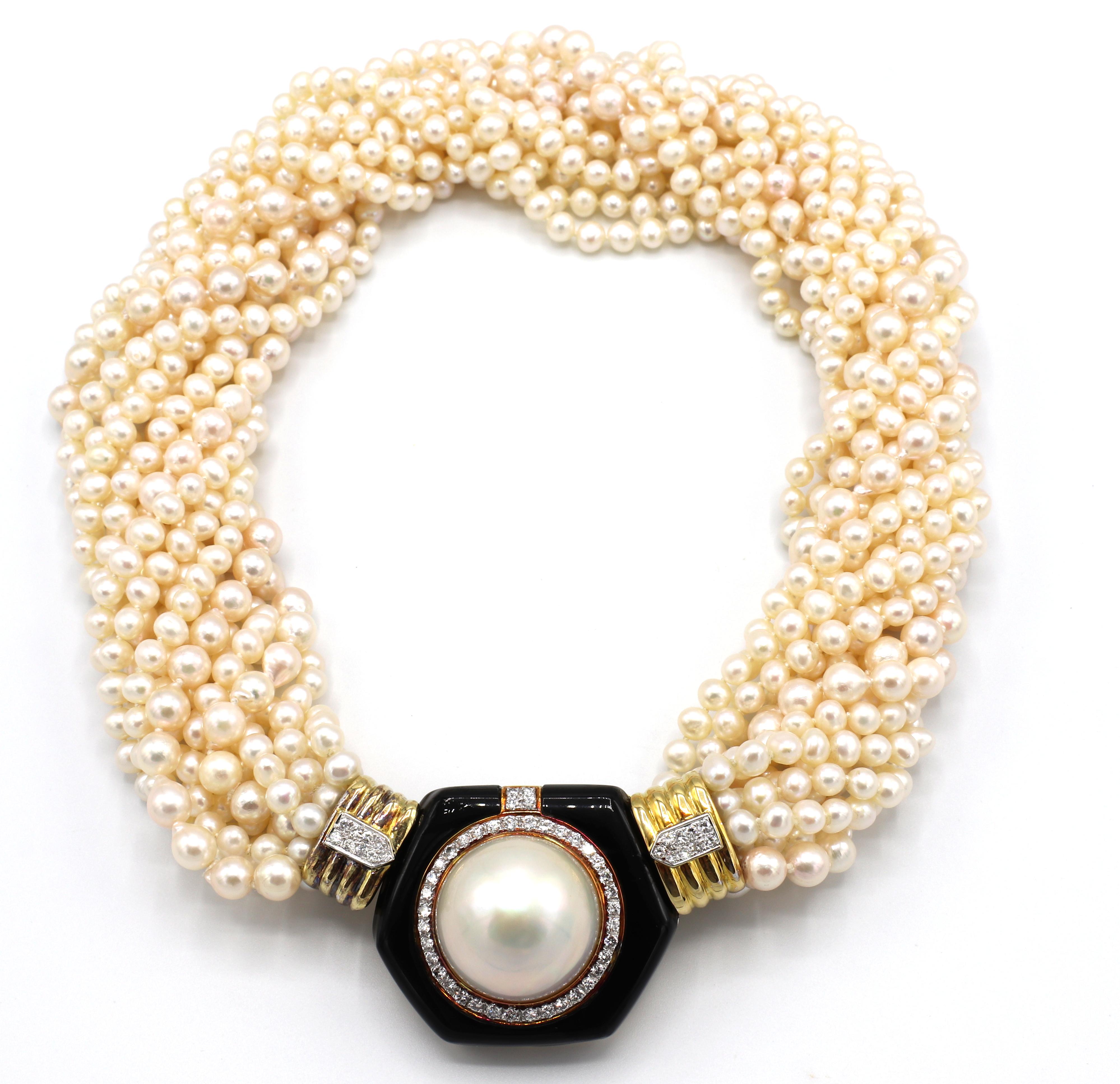 Massive Cultured Pearl, Diamond & Onyx Multi-Strand Pearl Yellow Gold Necklace 
Metal: 14k yellow gold
Weight: 255 grams
Diamonds: Approx. 2 CTW G VS
Pearls: 13 rows of round/oval/baroque cultured white pearls with a creamy luster 5-6.5mm
Clasp: 35
