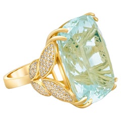 Massive cushion aquarimarine, diamonds ring in 18 k gold