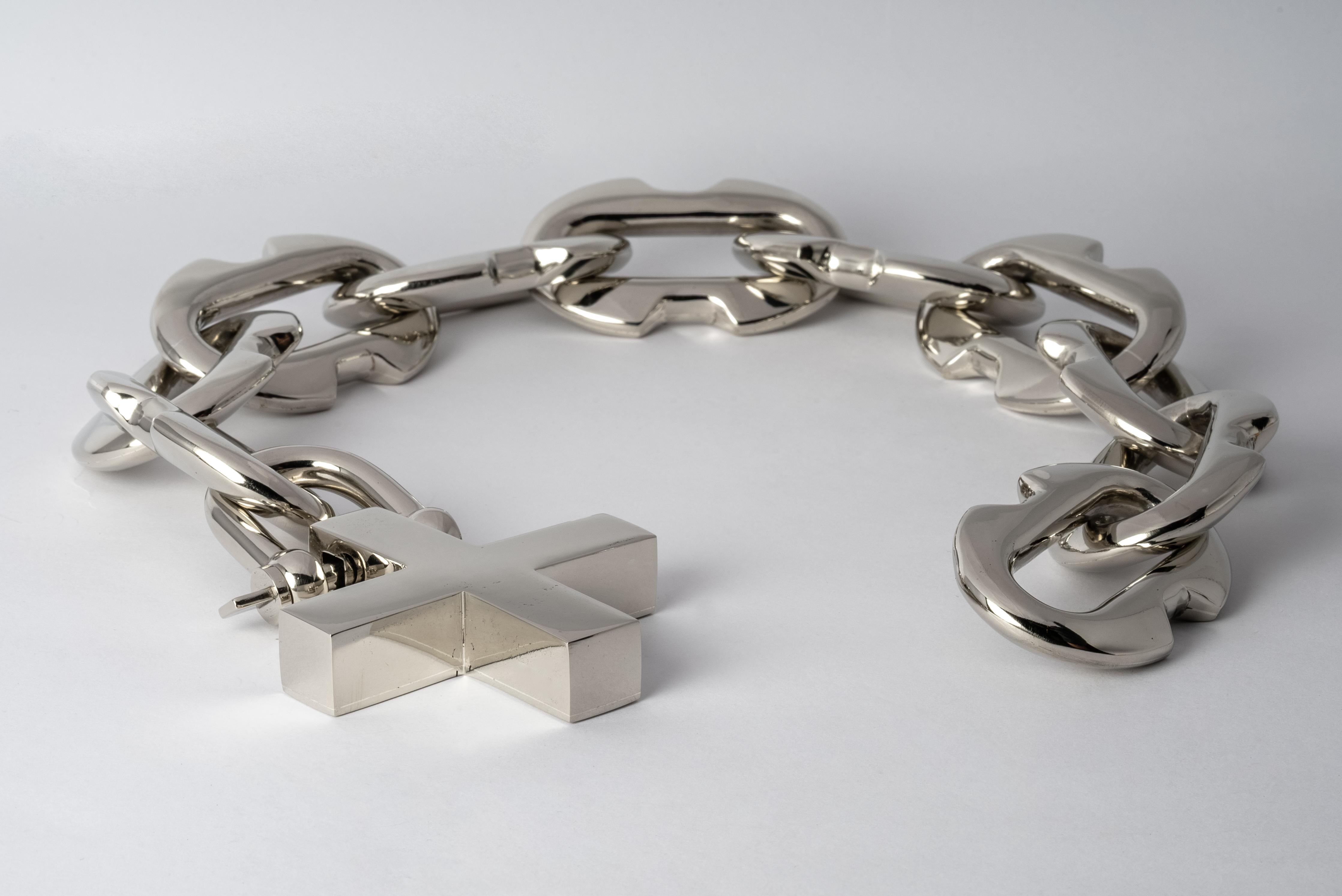 Chain necklace in bronze with polized white bronze. 
The Charm System is an interrelated group of products that can be mixed and matched or worn individually.
Chain link size (L × H): 70 mm × 43 mm
Chain length: 550 mm
Plus height: 72 mm
U-bolt