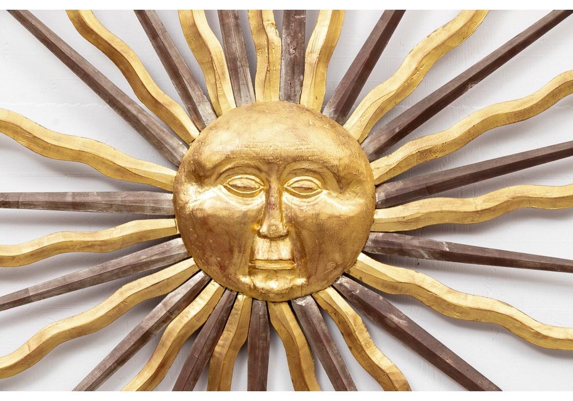 Massive Decorative Carved and Gilt Sunburst Wall Sculpture In Good Condition For Sale In Bridgeport, CT