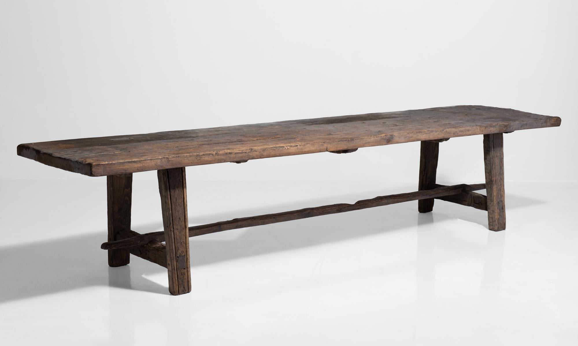 Beautifully aged table constructed of pine, with minimal detailing.