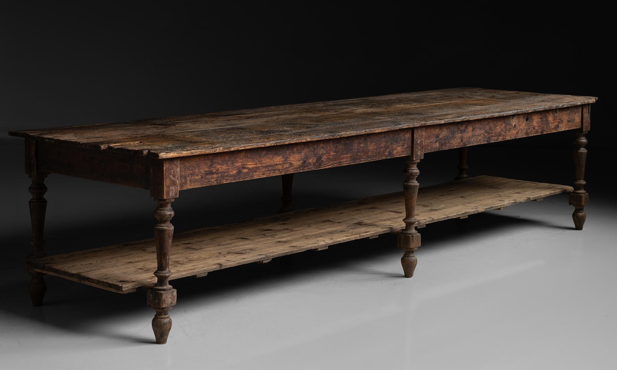Massive Draper's Table, 13 ft Long
Italy circa 1870
Impressive draper's table originally from a printing house, with weathered surface and bottom storage.
156”L x 45.25”d x 35”h
Ref. TABLE1266