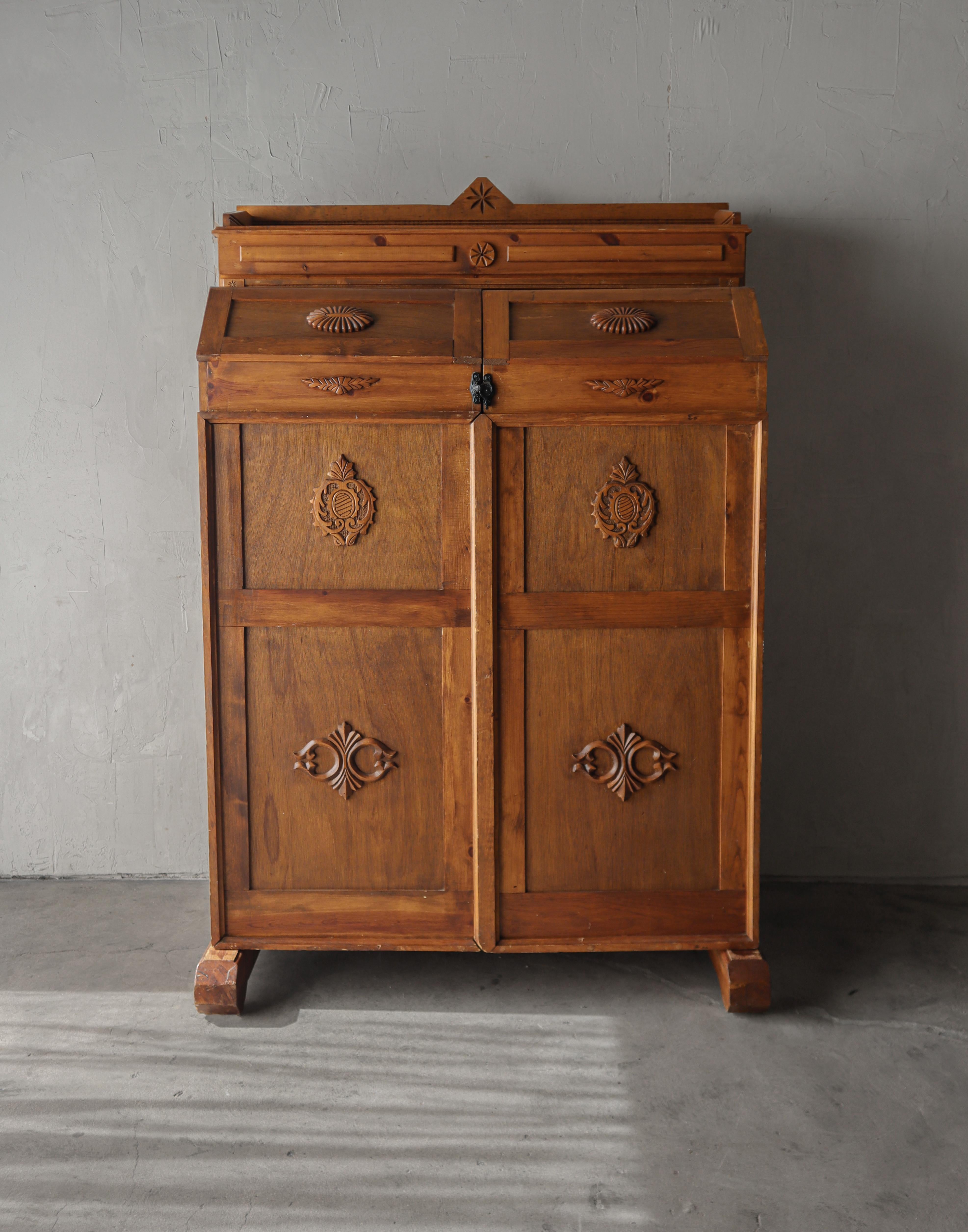 A beautiful example of an antique Wooten style desk cabinet, unlike any that I have ever seen.  This piece is massive in size and character, all the carved details make it so beautiful.  There are countless decades of gorgeous patina from age and