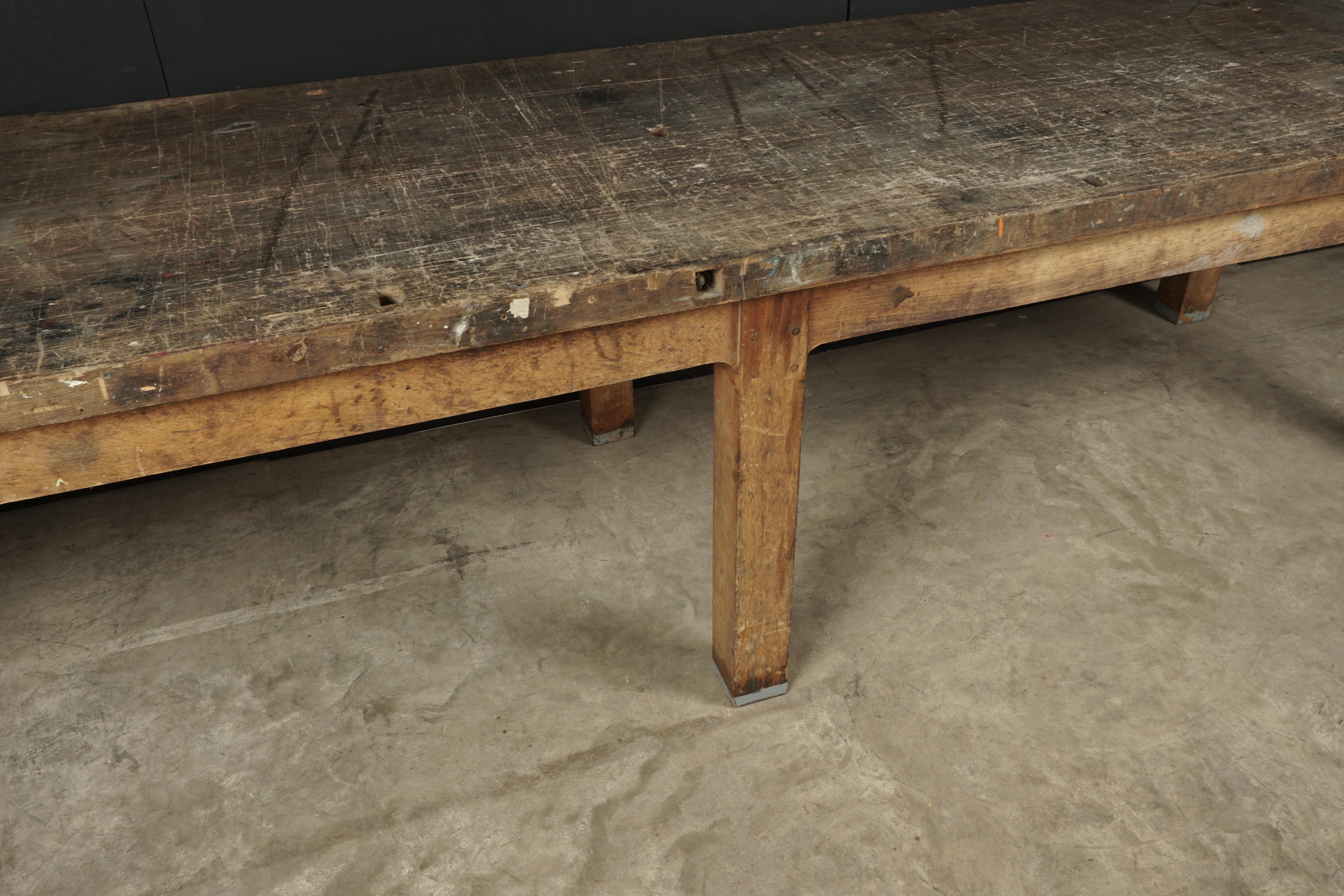 Rare dining table from a shipyard, France, circa 1920. Was told that it was previously used to cut sails. Fantastic two inch thick top with fantastic wear and patina.