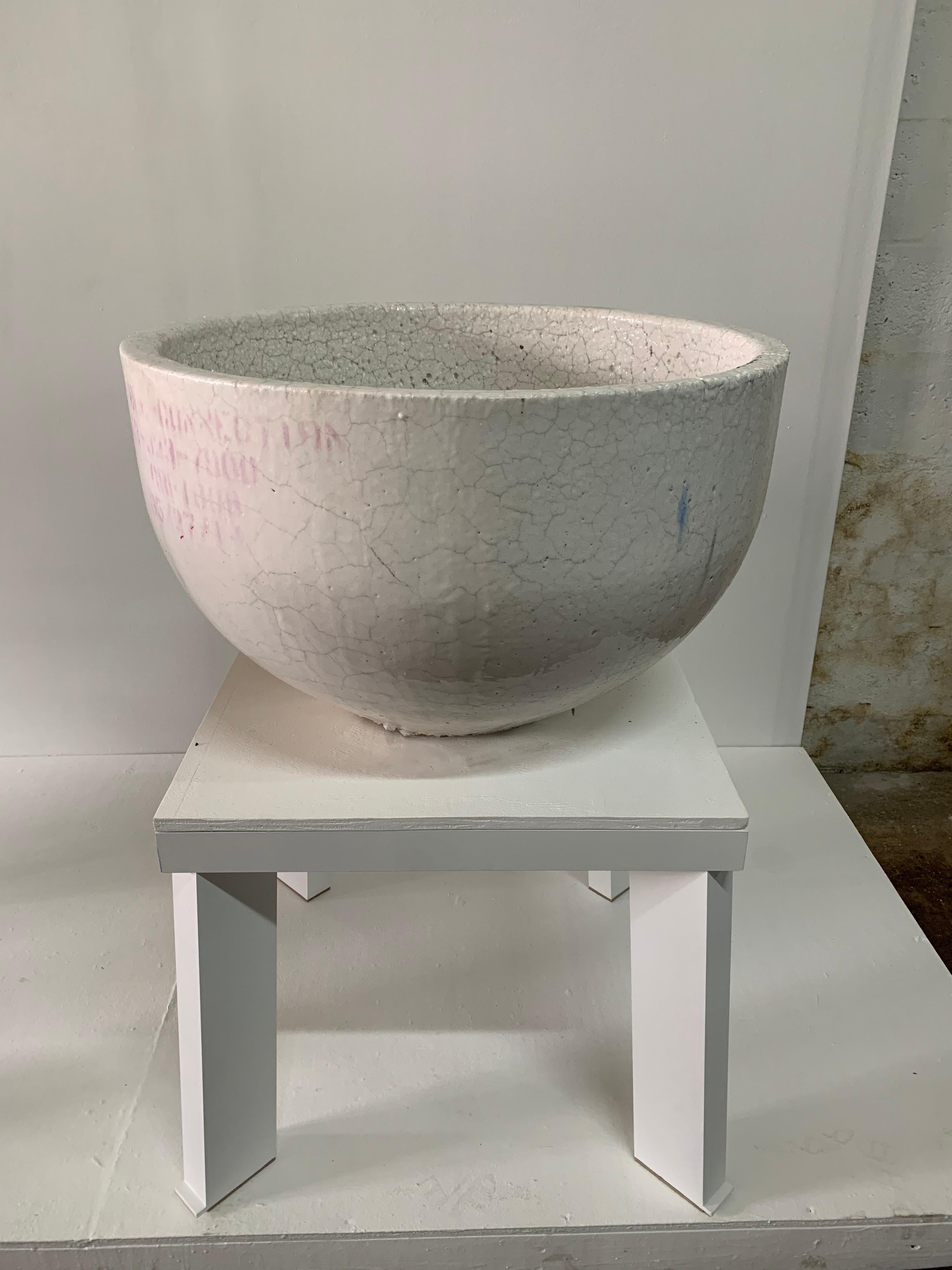 This amazing and large ceramic crucible that was used for industrial glass blowing and now used in high end decoration as Art vessels or orchid planters. It shows the residue at bottom (glass that remains in crystallized form) - each one completely