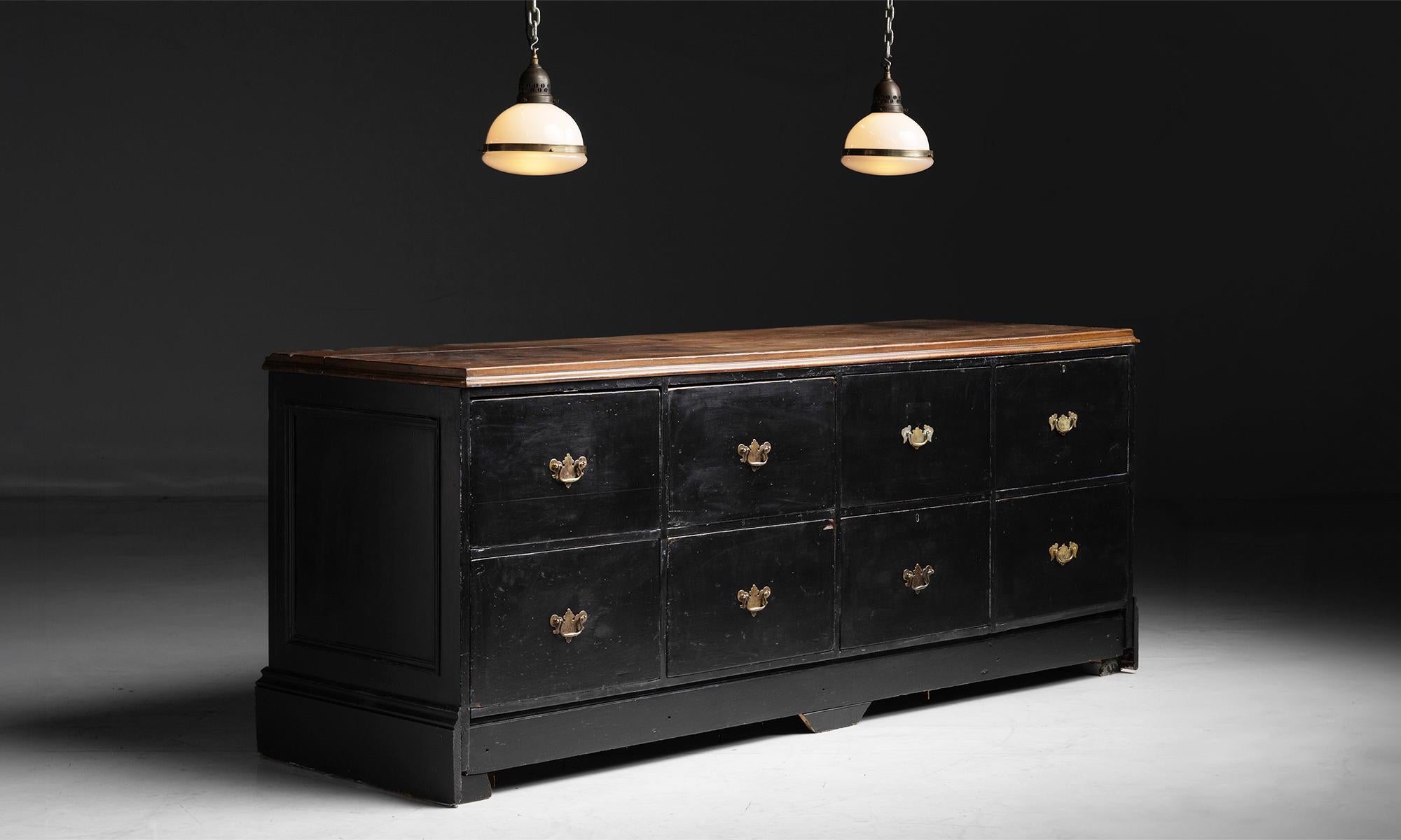 England circa 1900
With weathered surface, 8 drawers, brass handles, painted surface and finished back.
97”L x 29.25”d x 38.5”h