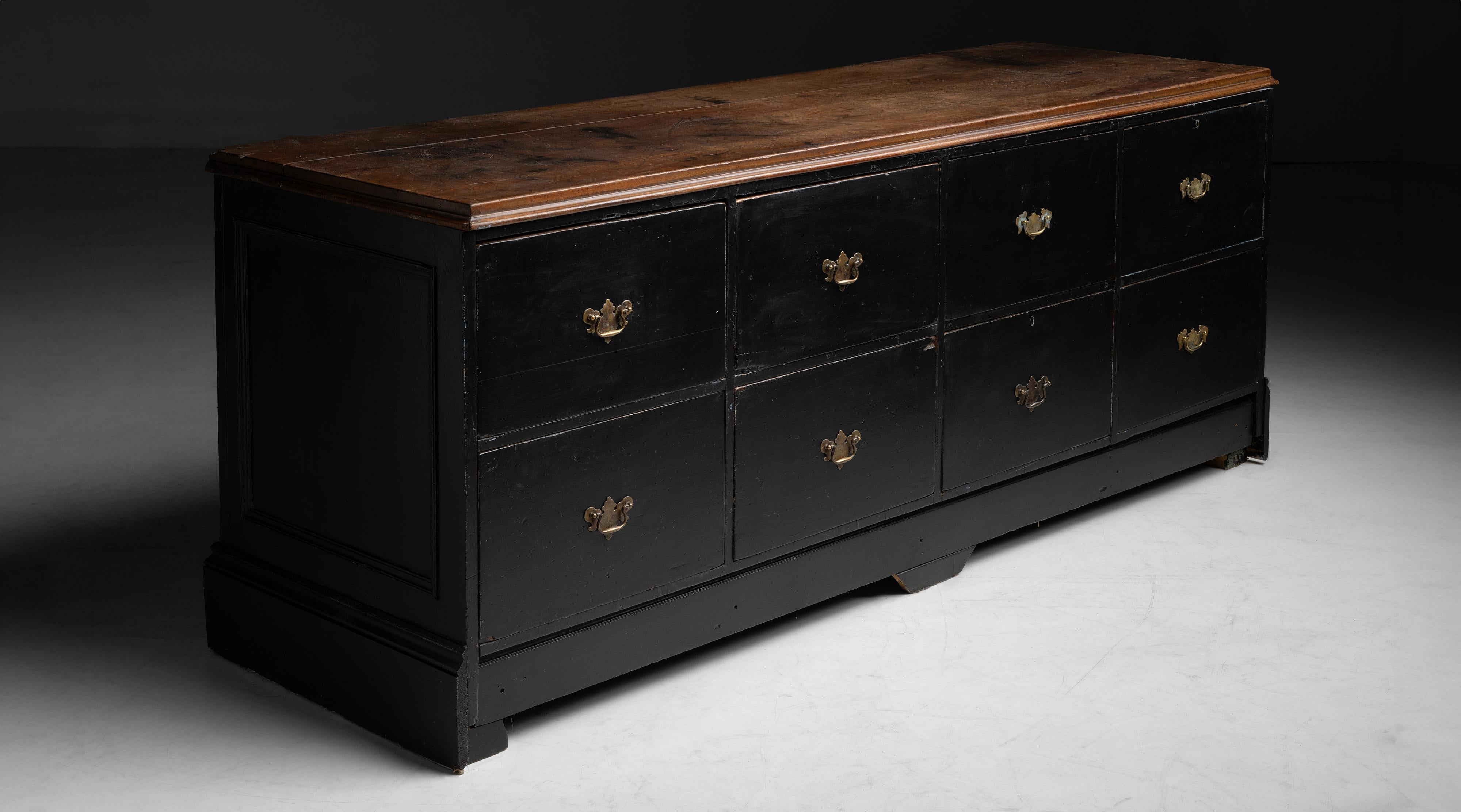 England circa 1900
With weathered surface, 8 drawers, brass handles, painted surface and finished back.
97”L x 29.25”d x 38.5”h