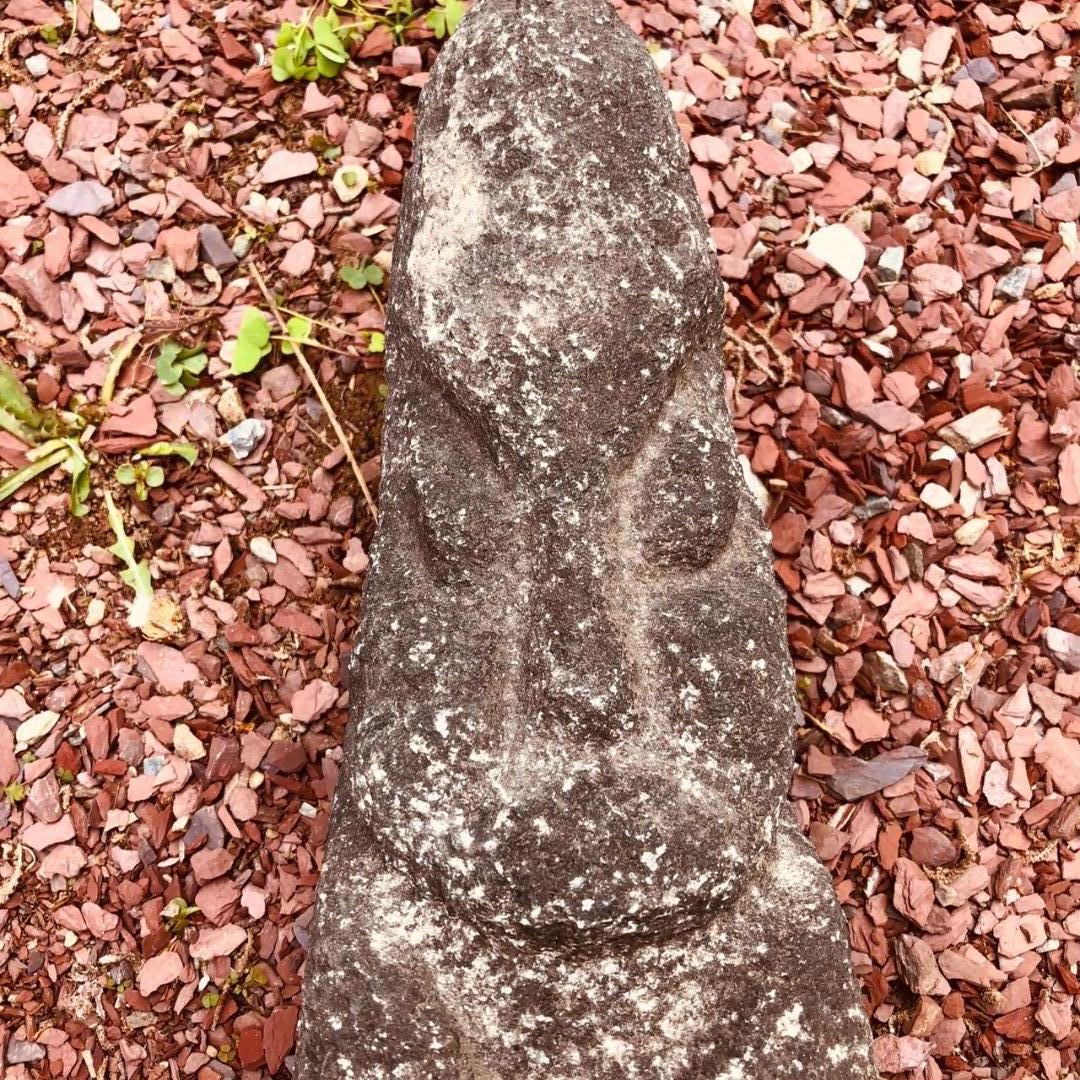 An opportunity to acquire a monumental hand carved stone figure from China. This is no ordinary sculpture. The unusual effigy carving was probably intended to be used in a ceremonial and work place as witnessed by the phallic tip of the angular