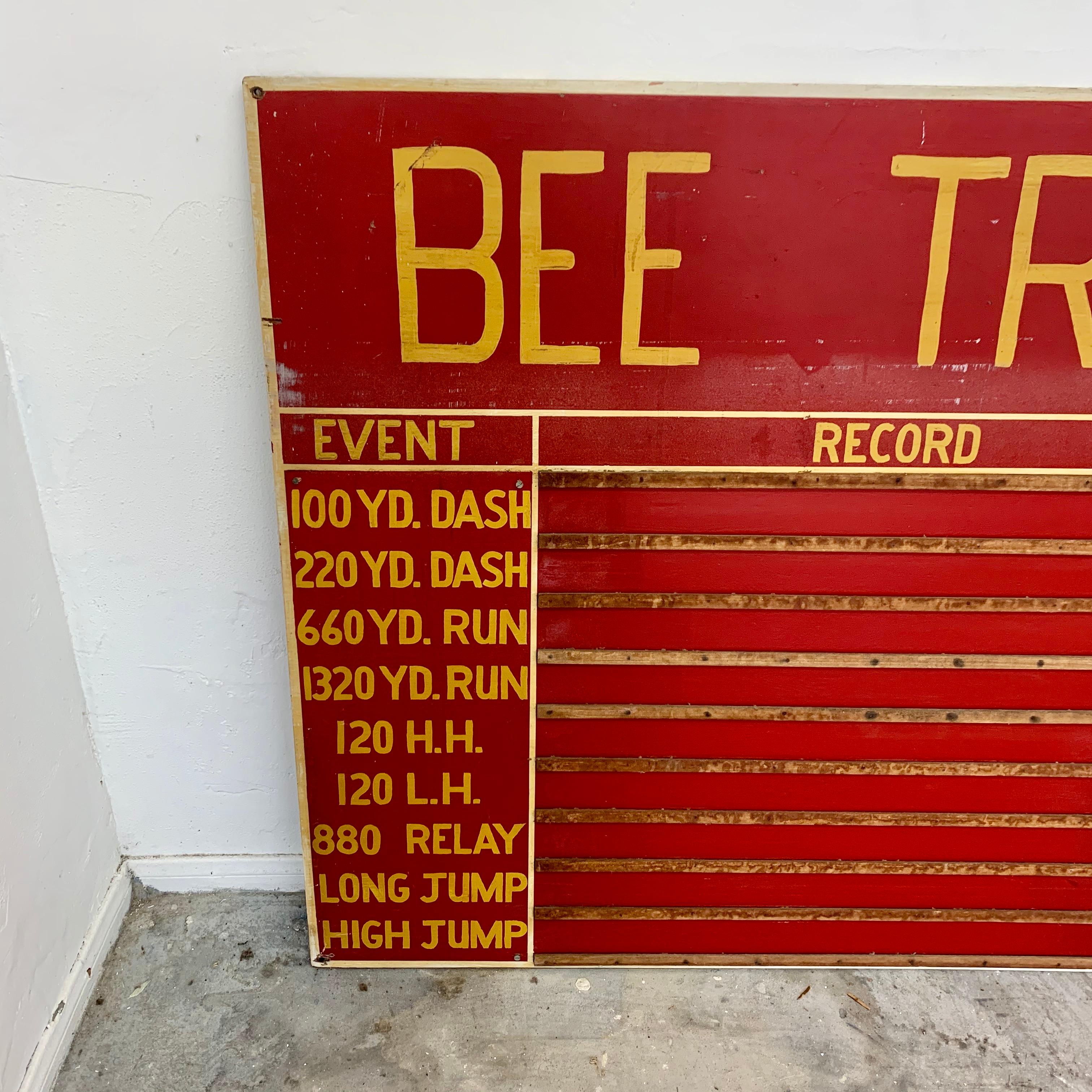 Hand-Carved Massive Hand Painted High School Track and Field Sign For Sale